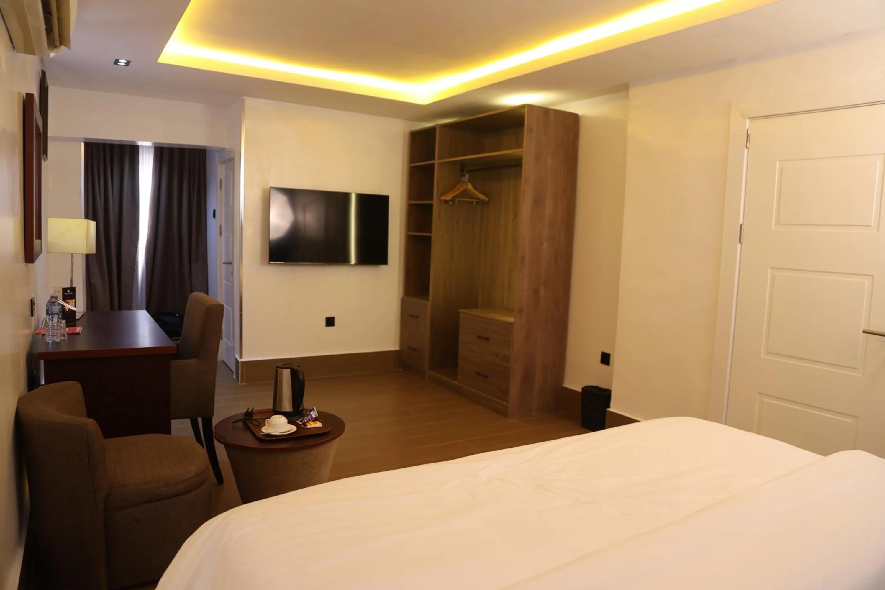 Bed in Bolton White Residence