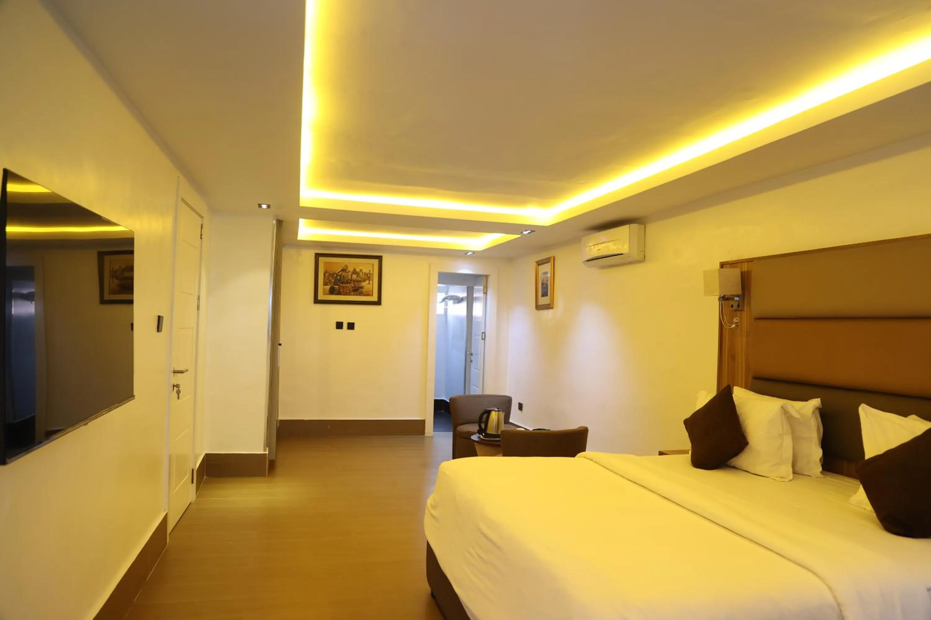 Bed in Bolton White Residence