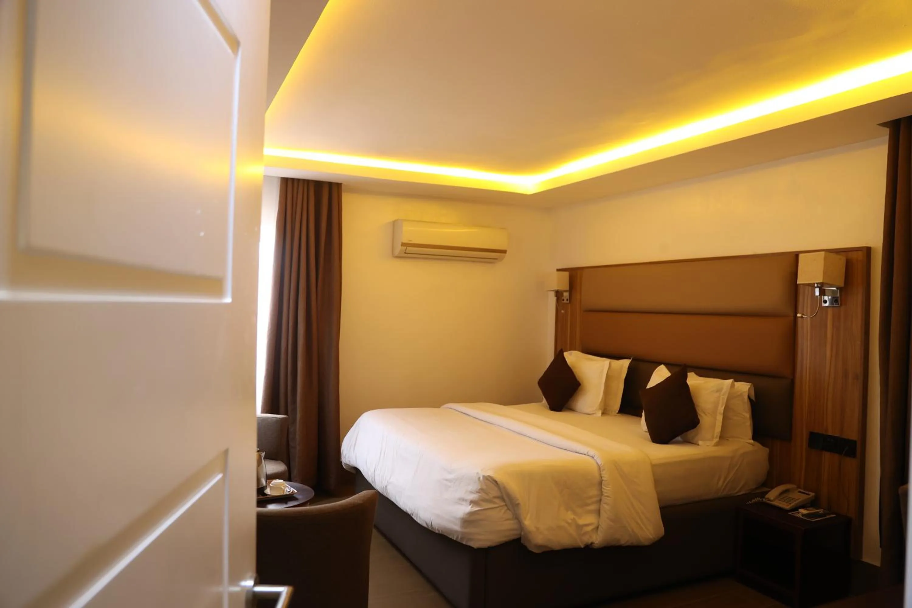 Bed in Bolton White Residence