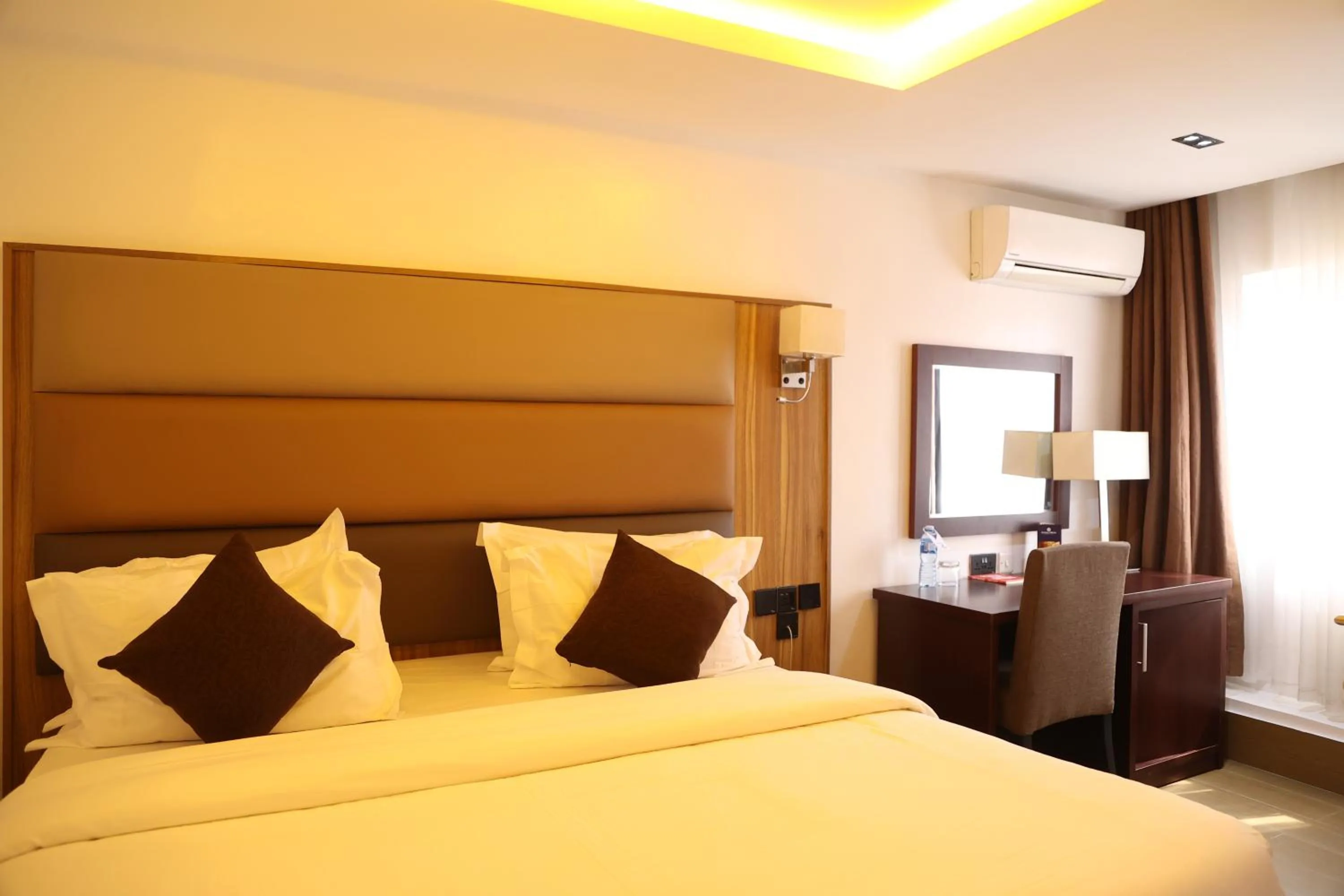 Bed in Bolton White Residence