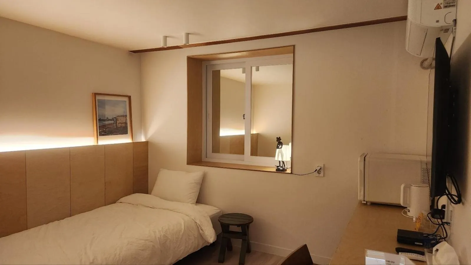 Bed in World House Hotel