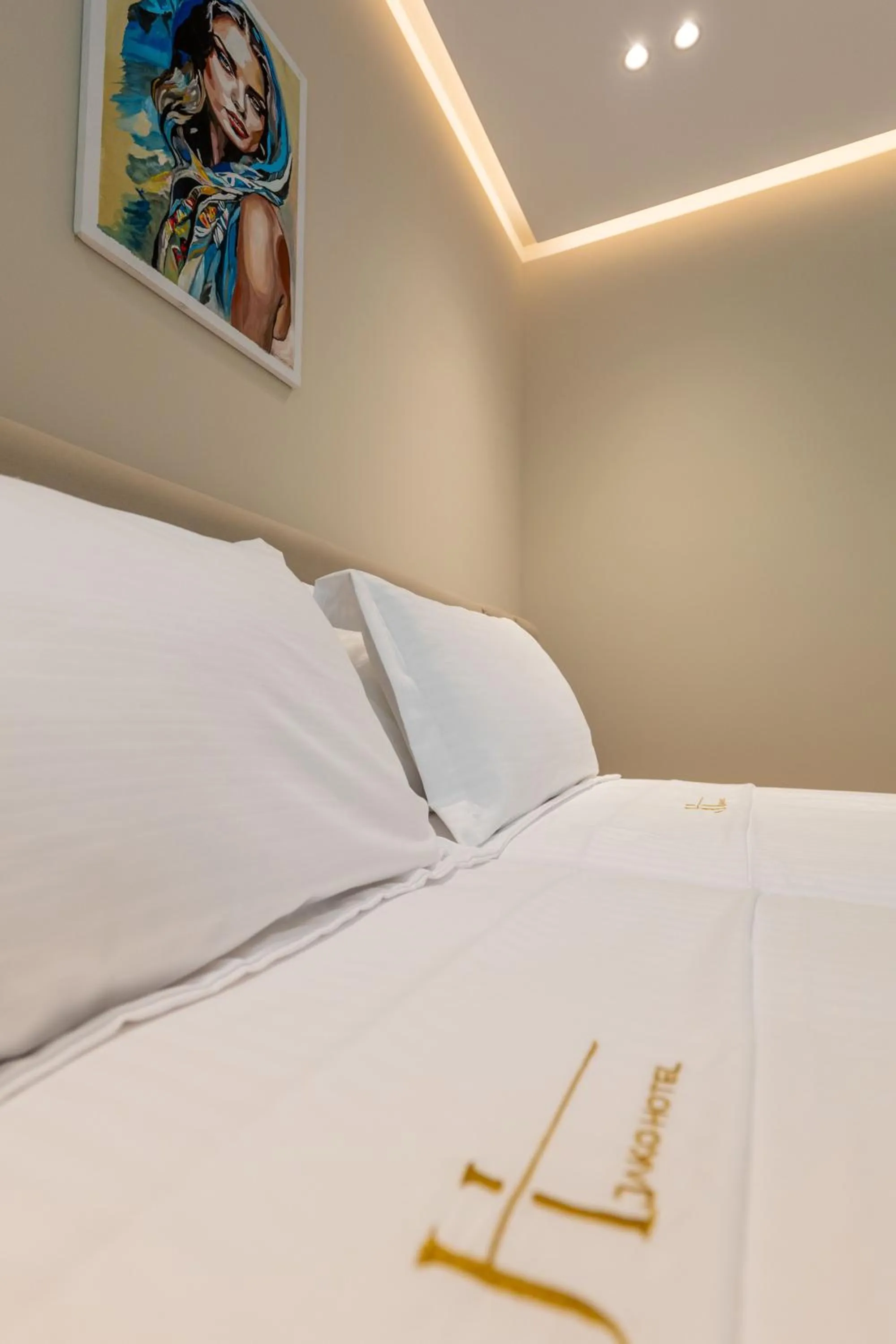 Bed in Jako Premium Hotel