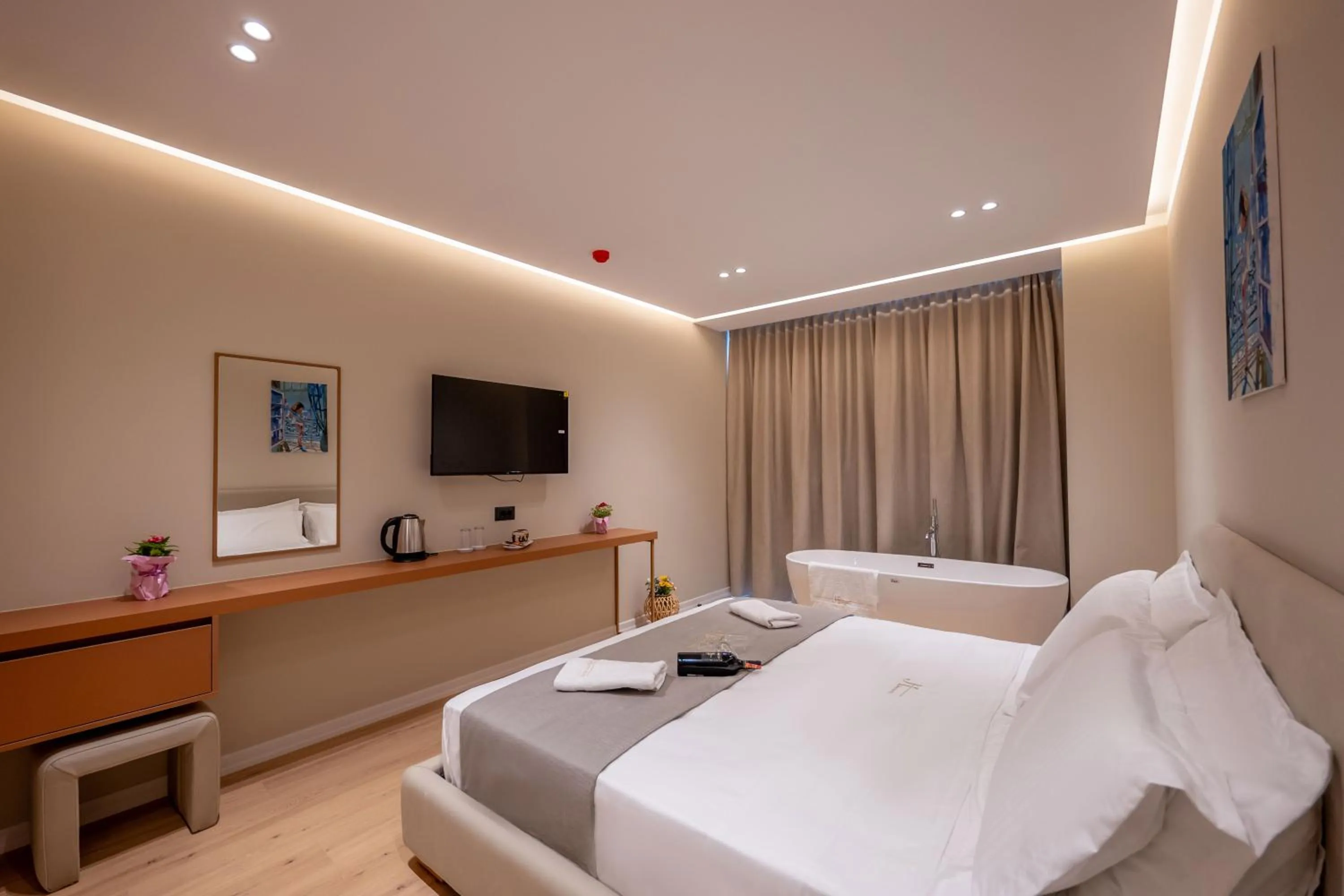 Bed in Jako Premium Hotel