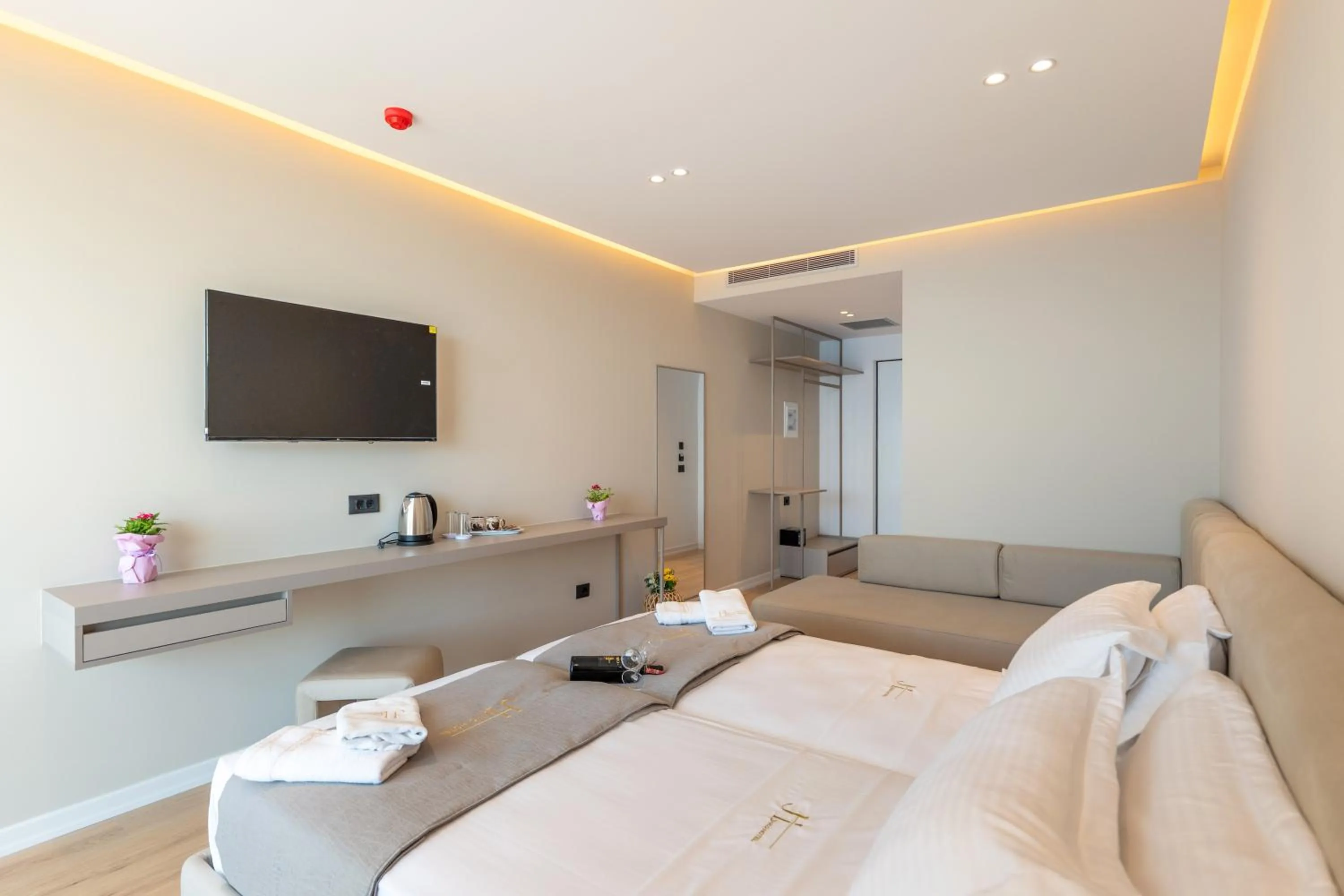 Bed in Jako Premium Hotel