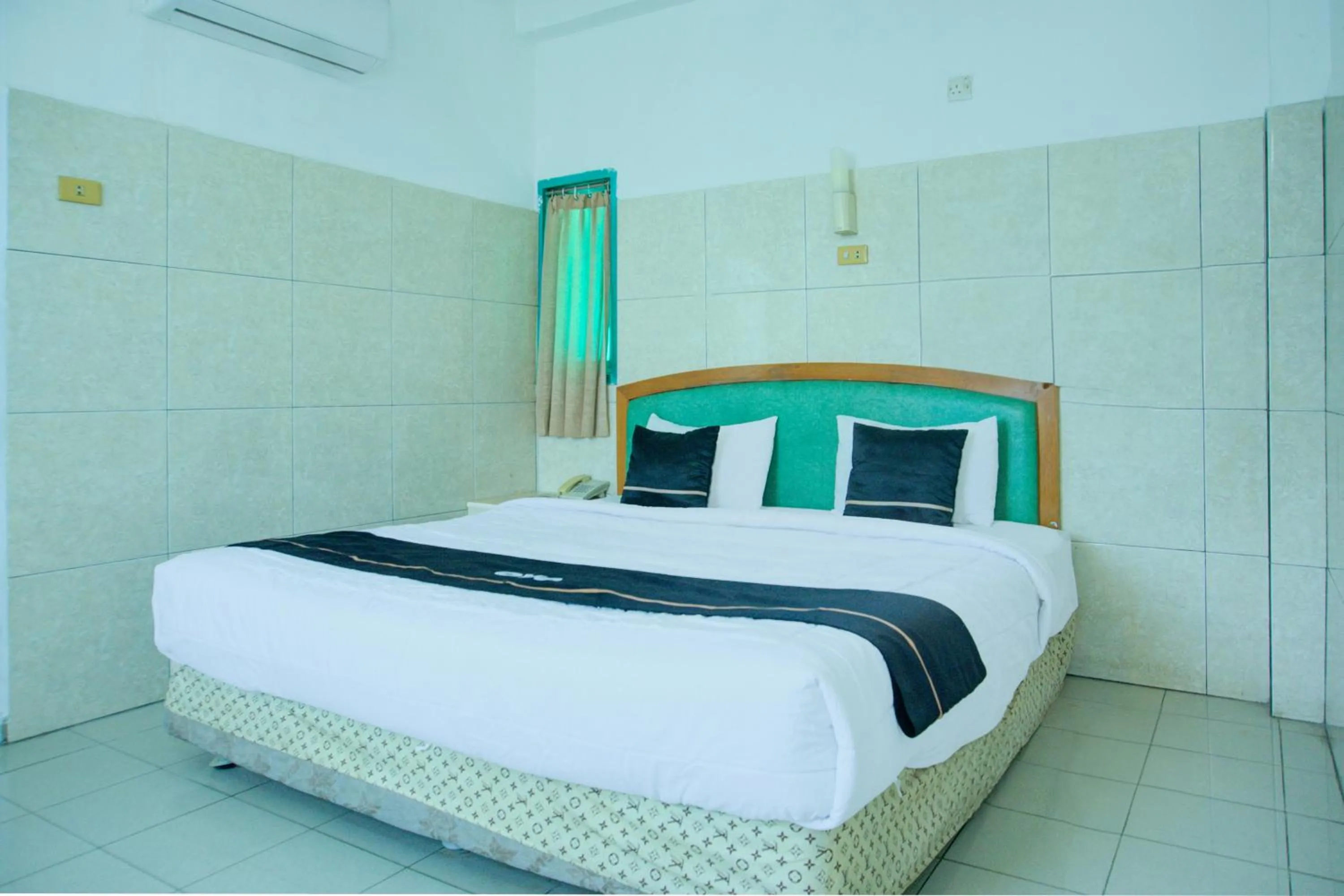 Bedroom, Bed in Townhouse Oak Palembang Near Jembatan Ampera Formerly Azzura Hotel