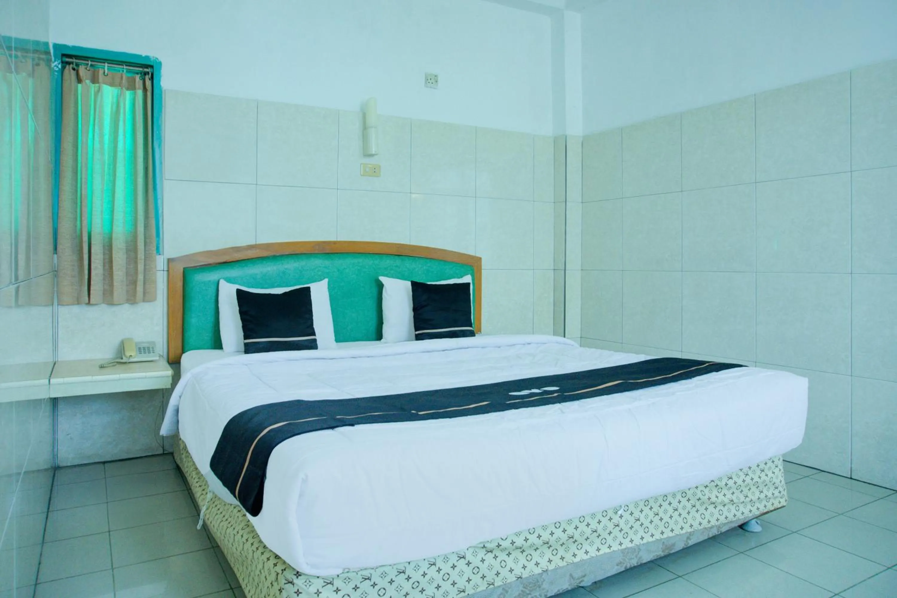Bedroom, Bed in Townhouse Oak Palembang Near Jembatan Ampera Formerly Azzura Hotel