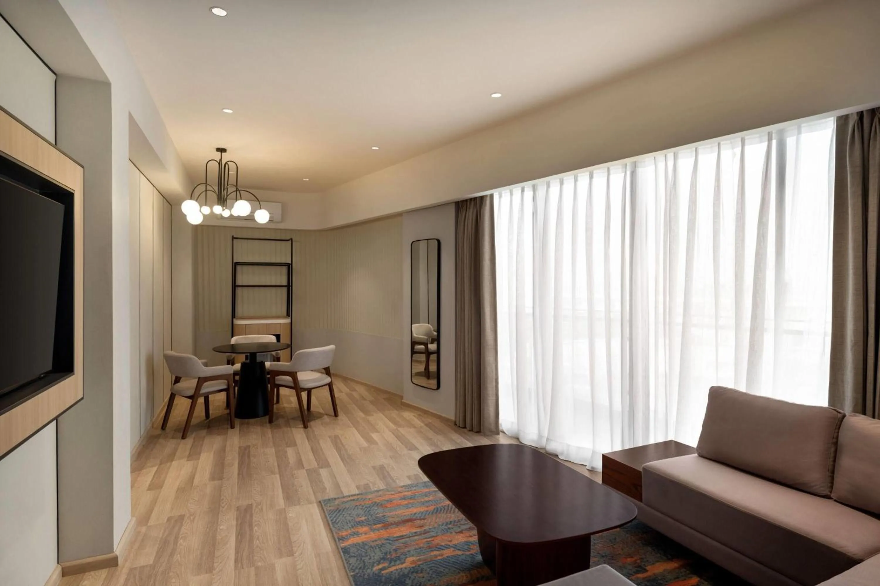 Photo of the whole room in Ramada Encore by Wyndham Gurugram Dwarka Expressway