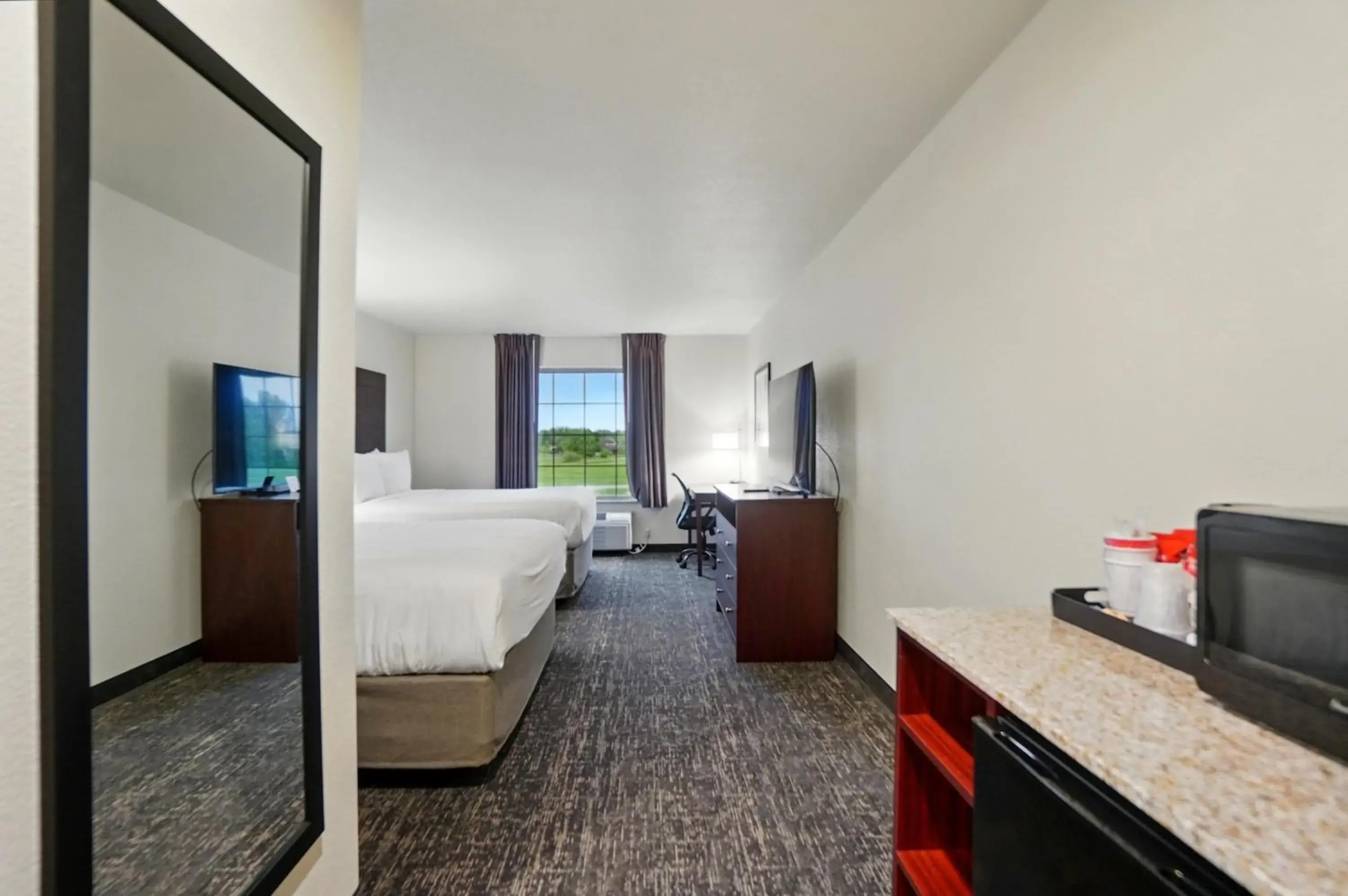 Queen Room in Cobblestone Hotel & Suites - Eaton Queen Room in Cobblestone Hotel & Suites - Eaton