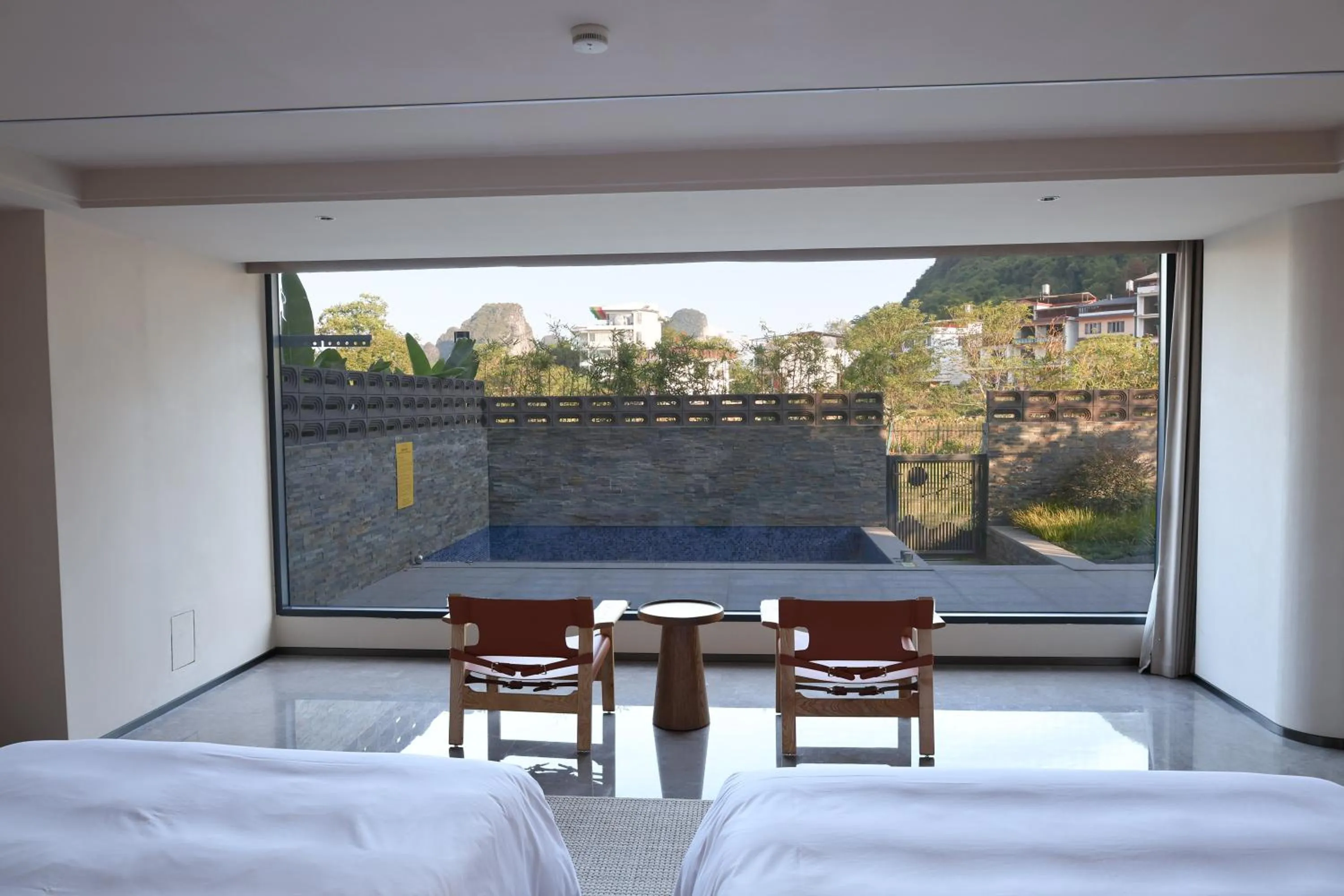 Inner courtyard view, Bed in voco Guilin Yangshuo