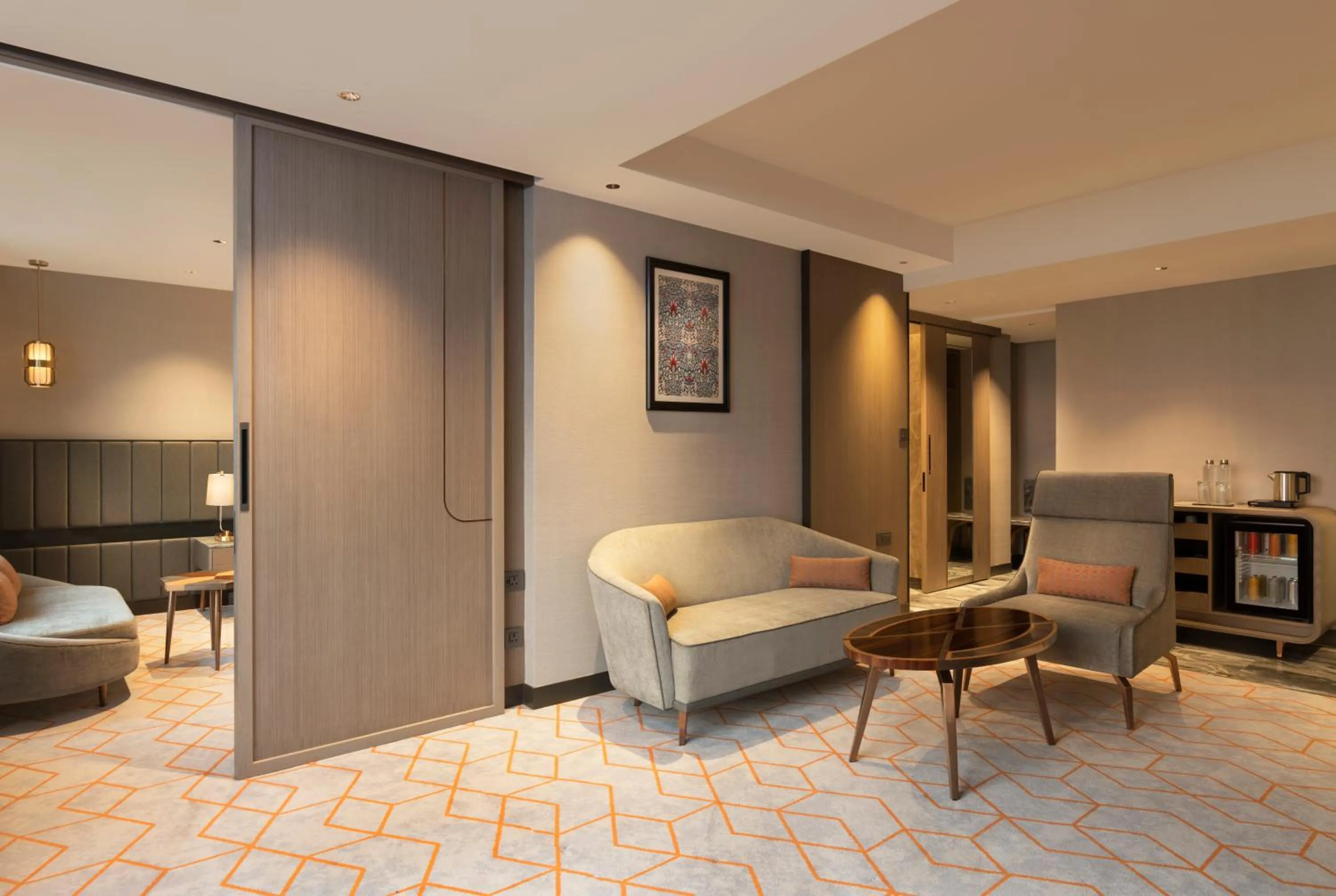 Living room, Bed in Crowne Plaza Lucknow by IHG