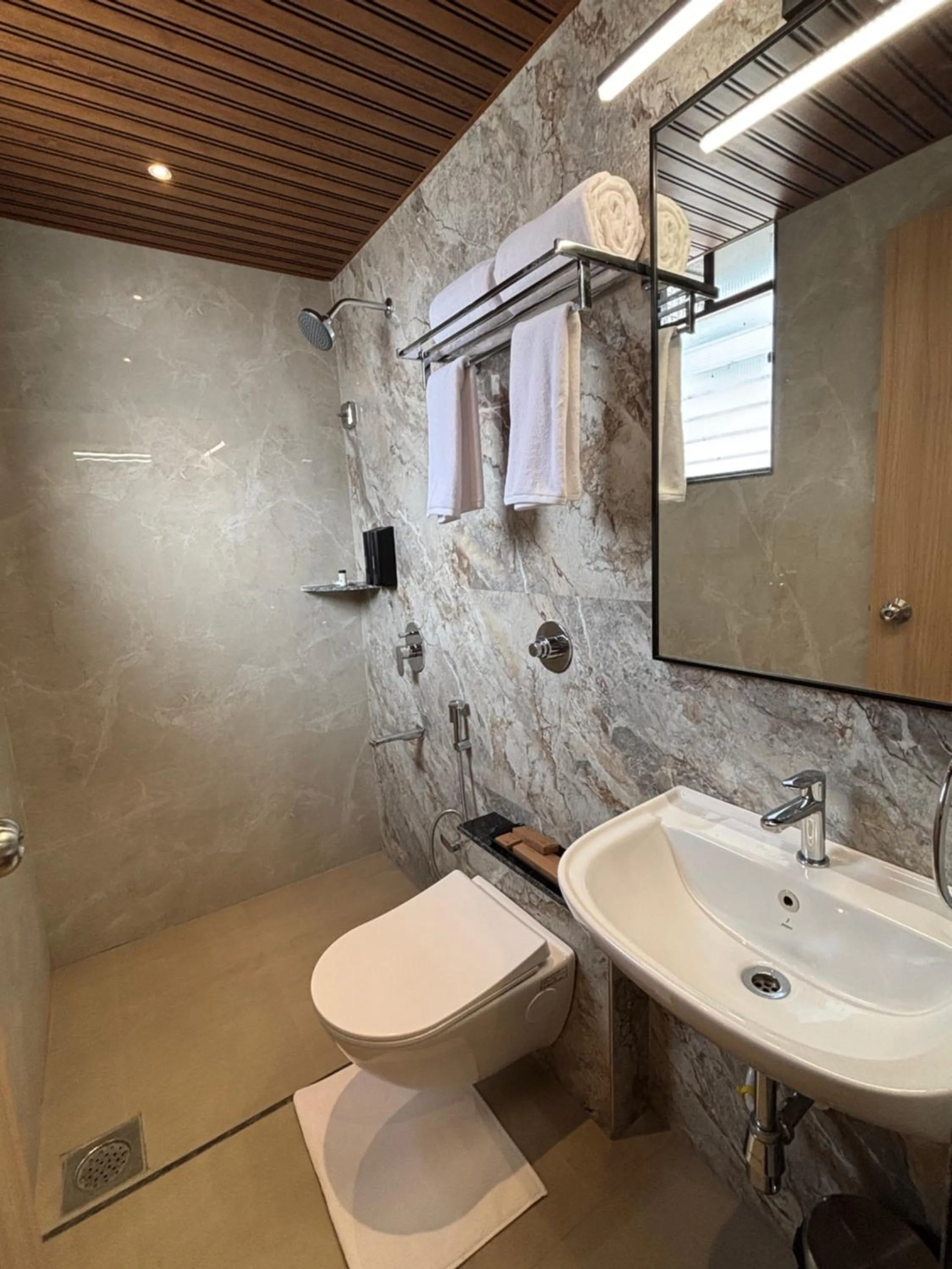 Bathroom in Mastiff Hotel Hinjawadi Pune