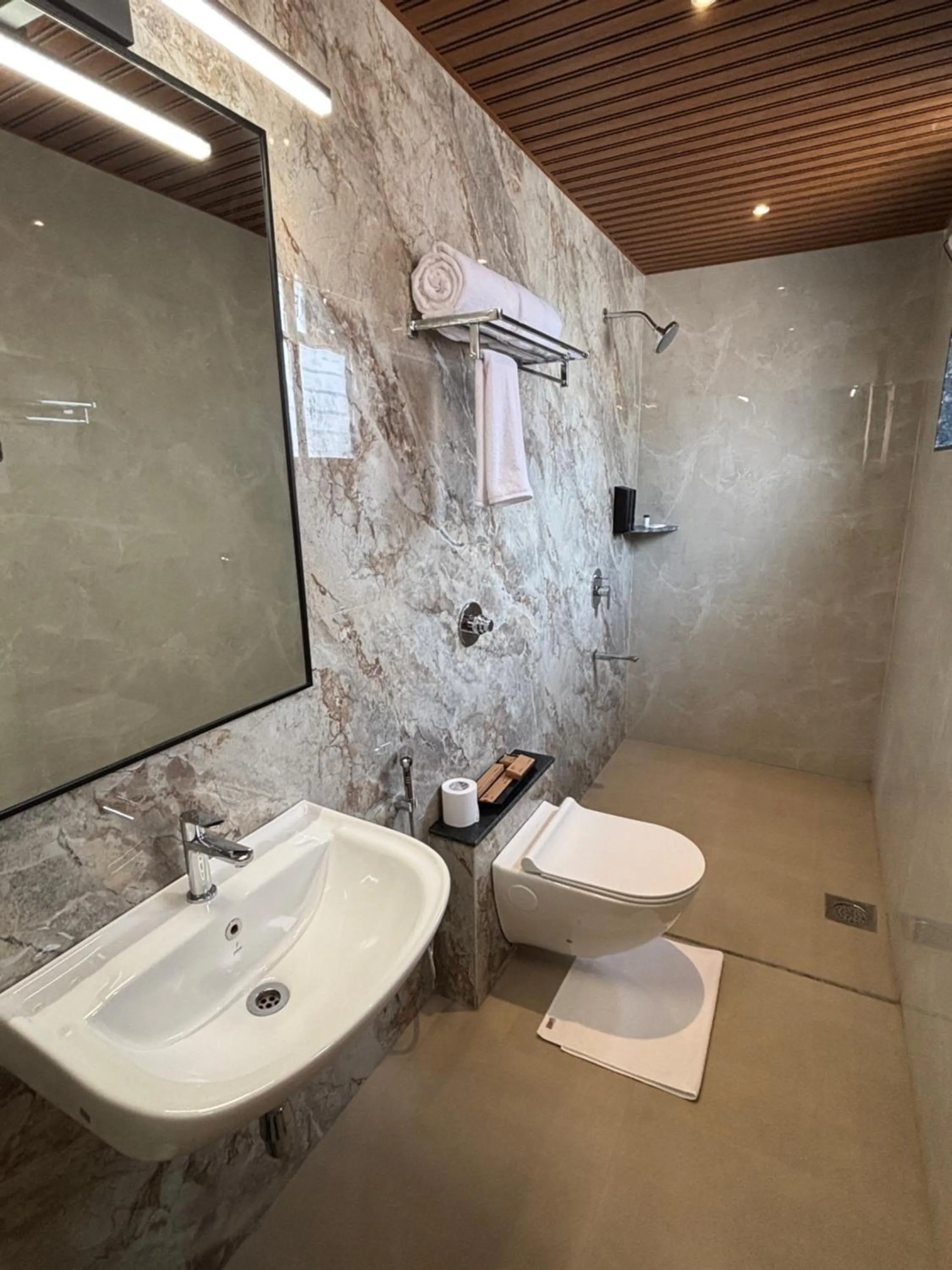 Bathroom in Mastiff Hotel Hinjawadi Pune