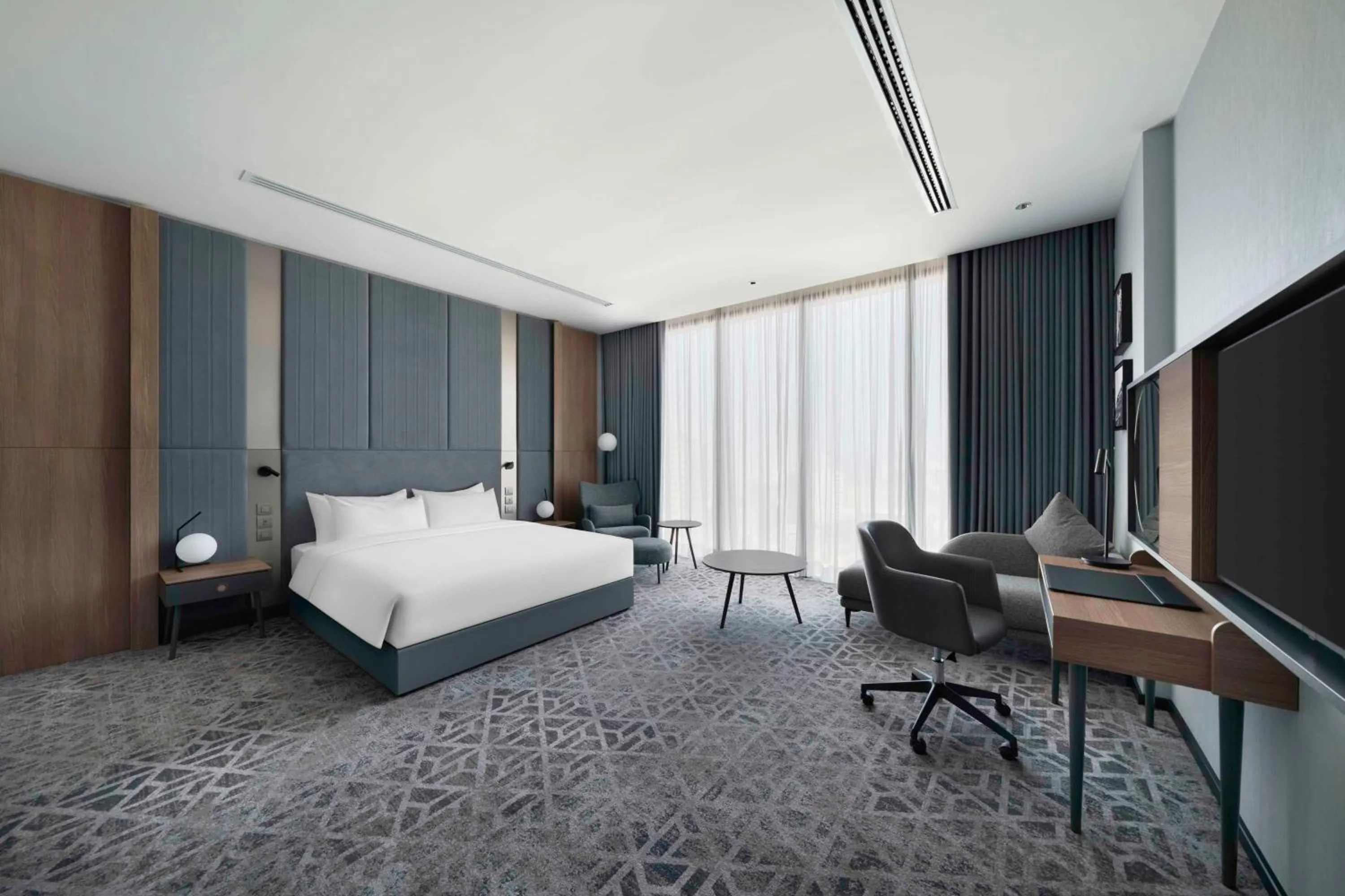 Photo of the whole room, Bed in Radisson Blu Hotel, Riyadh Al Sahafa