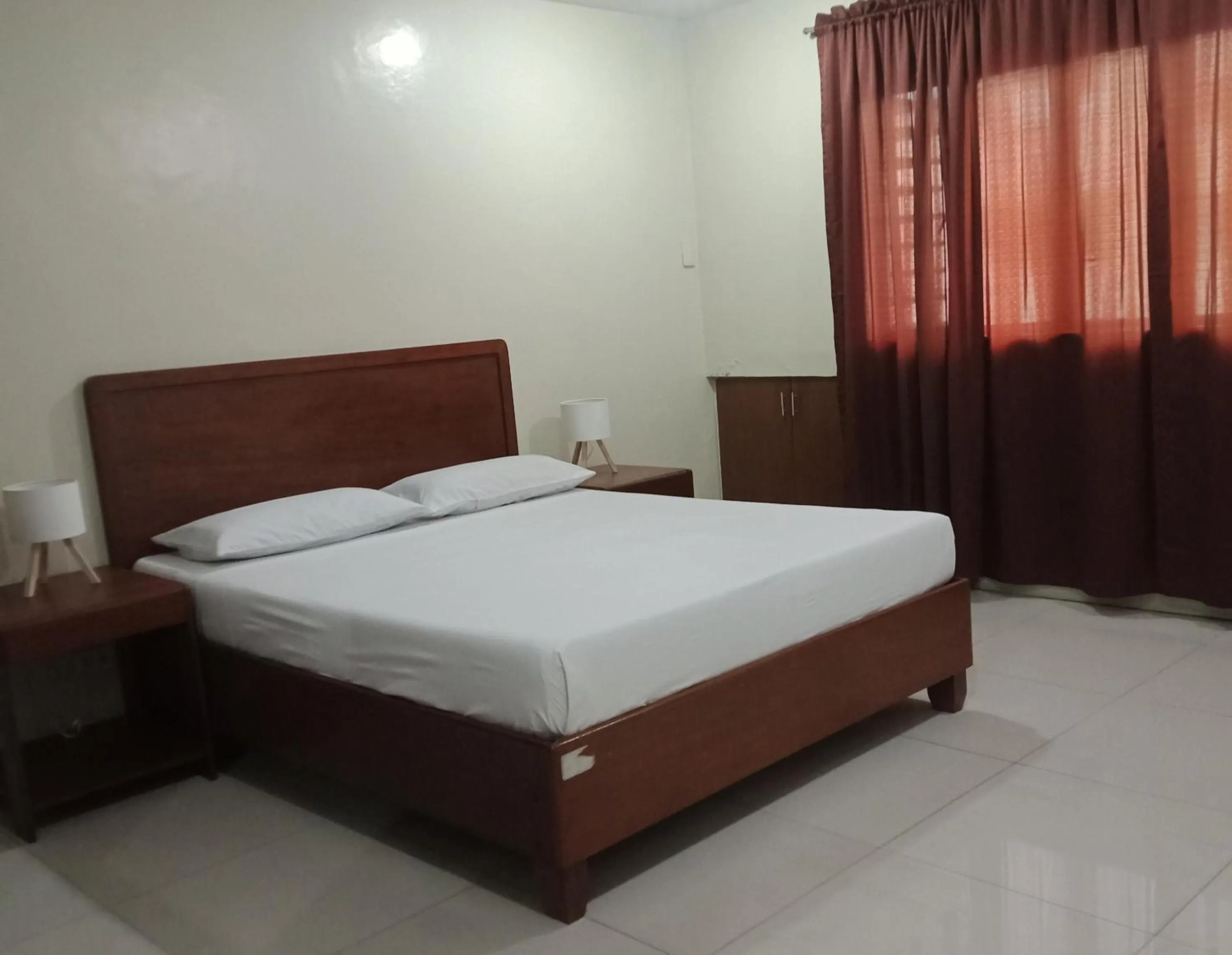 Bed in Joyce Apartelle San Juan