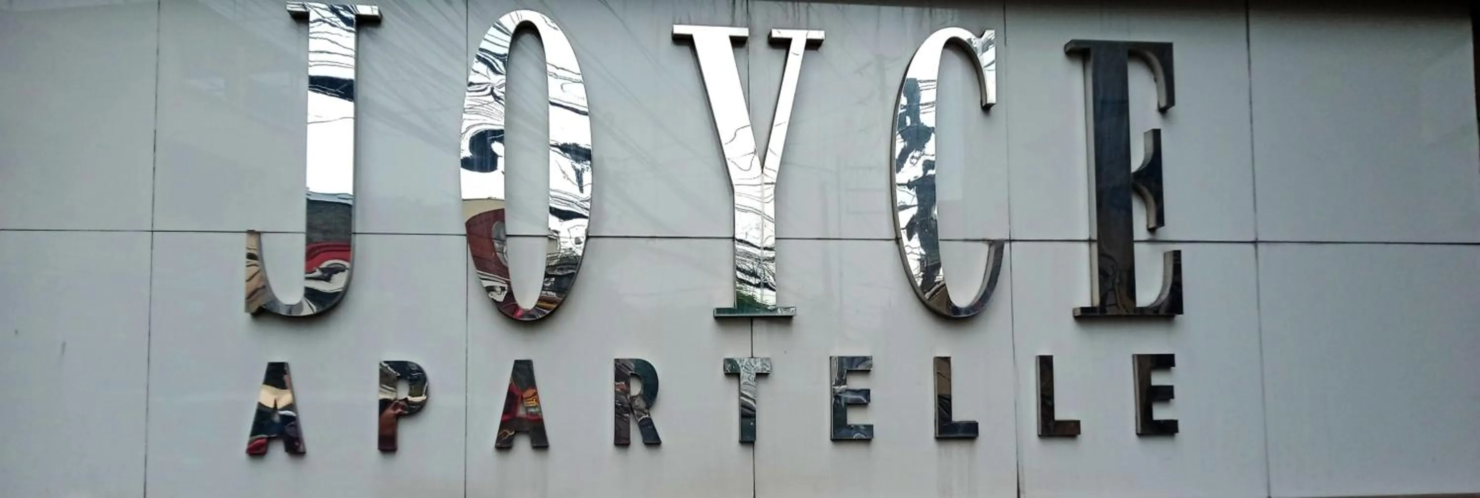 Property logo or sign in Joyce Apartelle San Juan