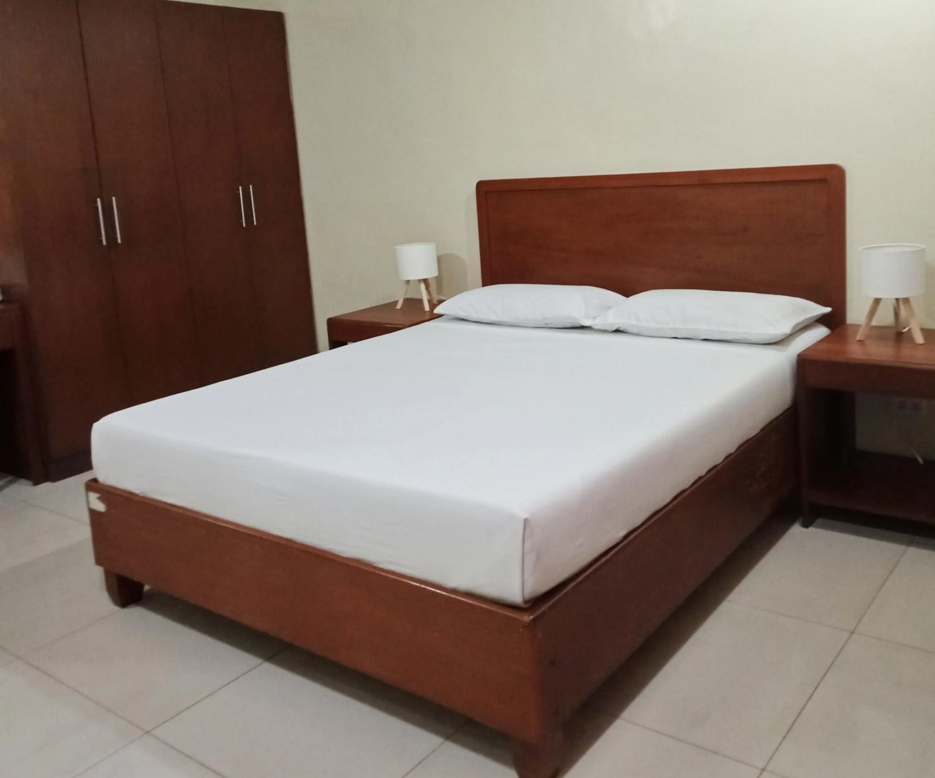 Bed in Joyce Apartelle San Juan