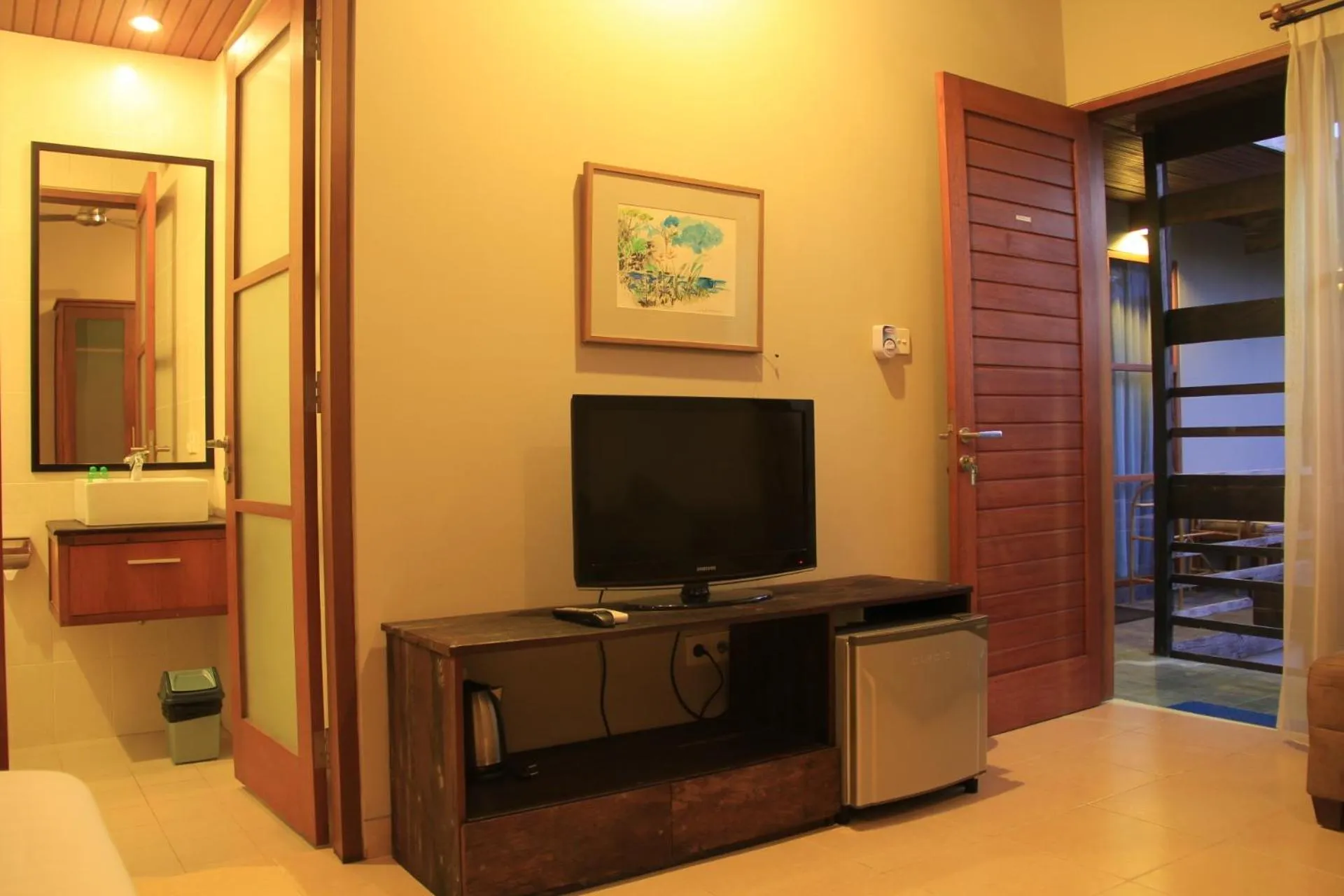 Communal lounge/ TV room in Semarandana Bedrooms and Pool