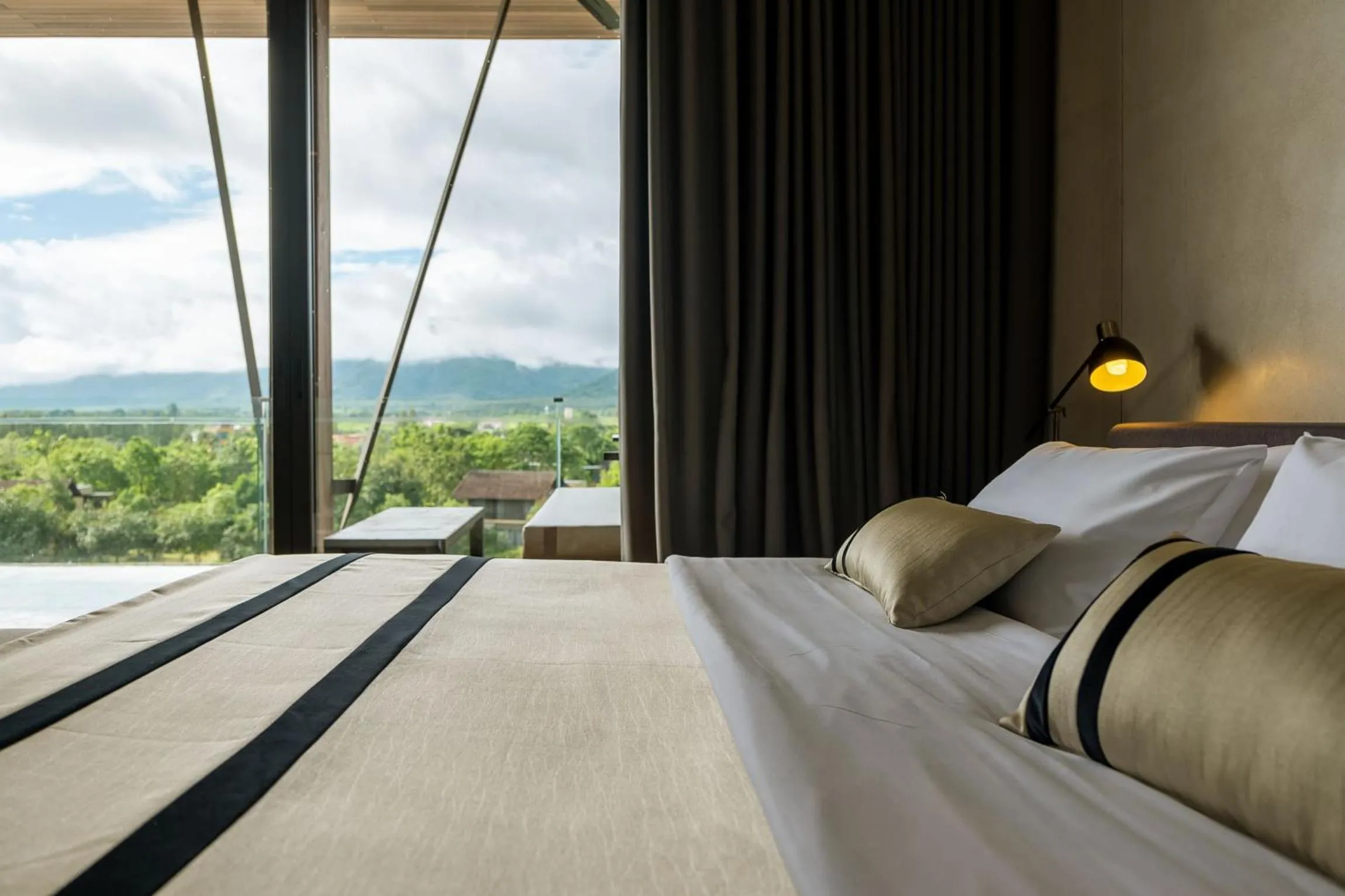 Bed in atta Lakeside Resort Suite - SHA Plus Certified