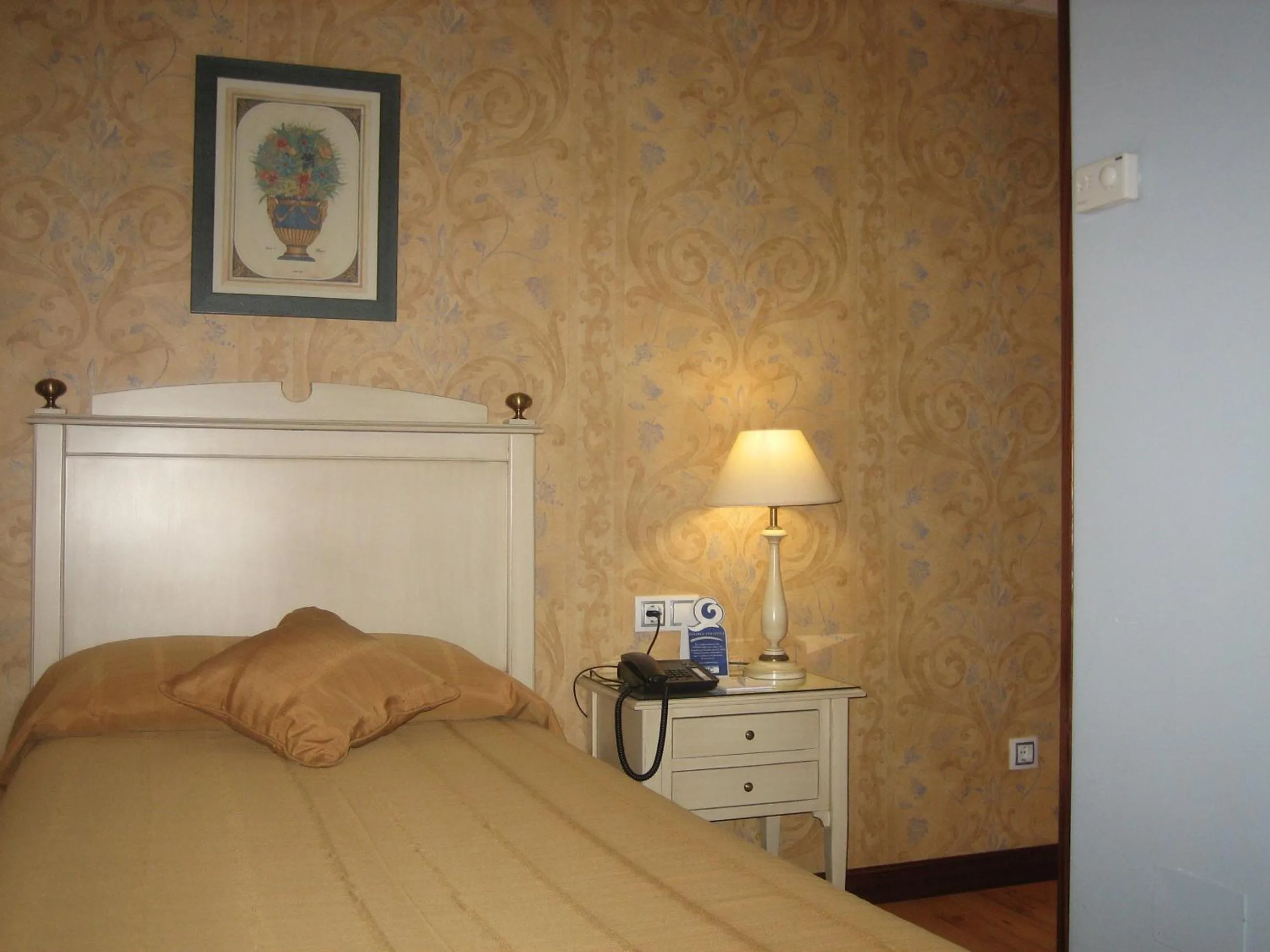 Bed in Hotel Santiago