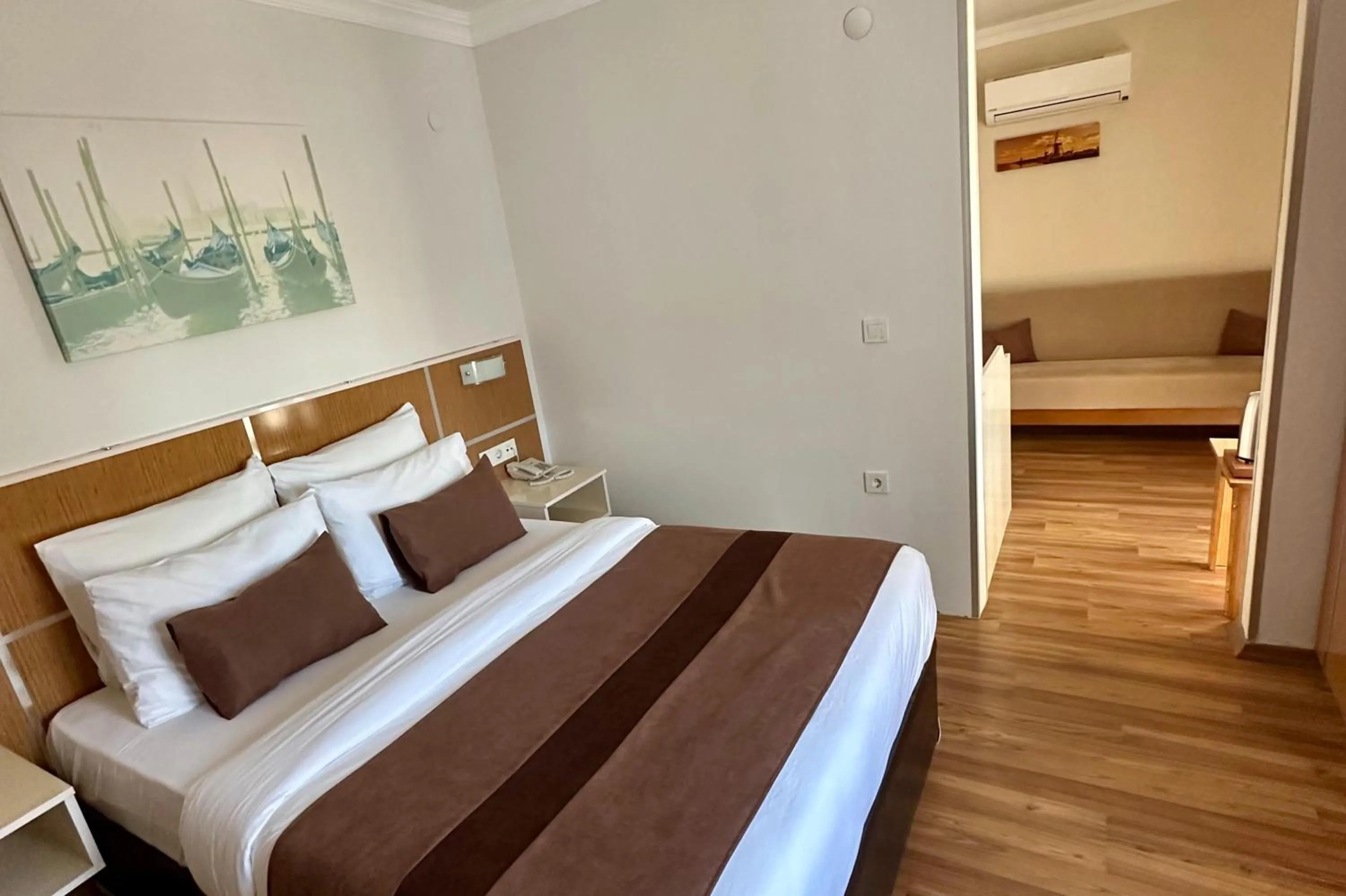 Bed in Palm Beach Hotel