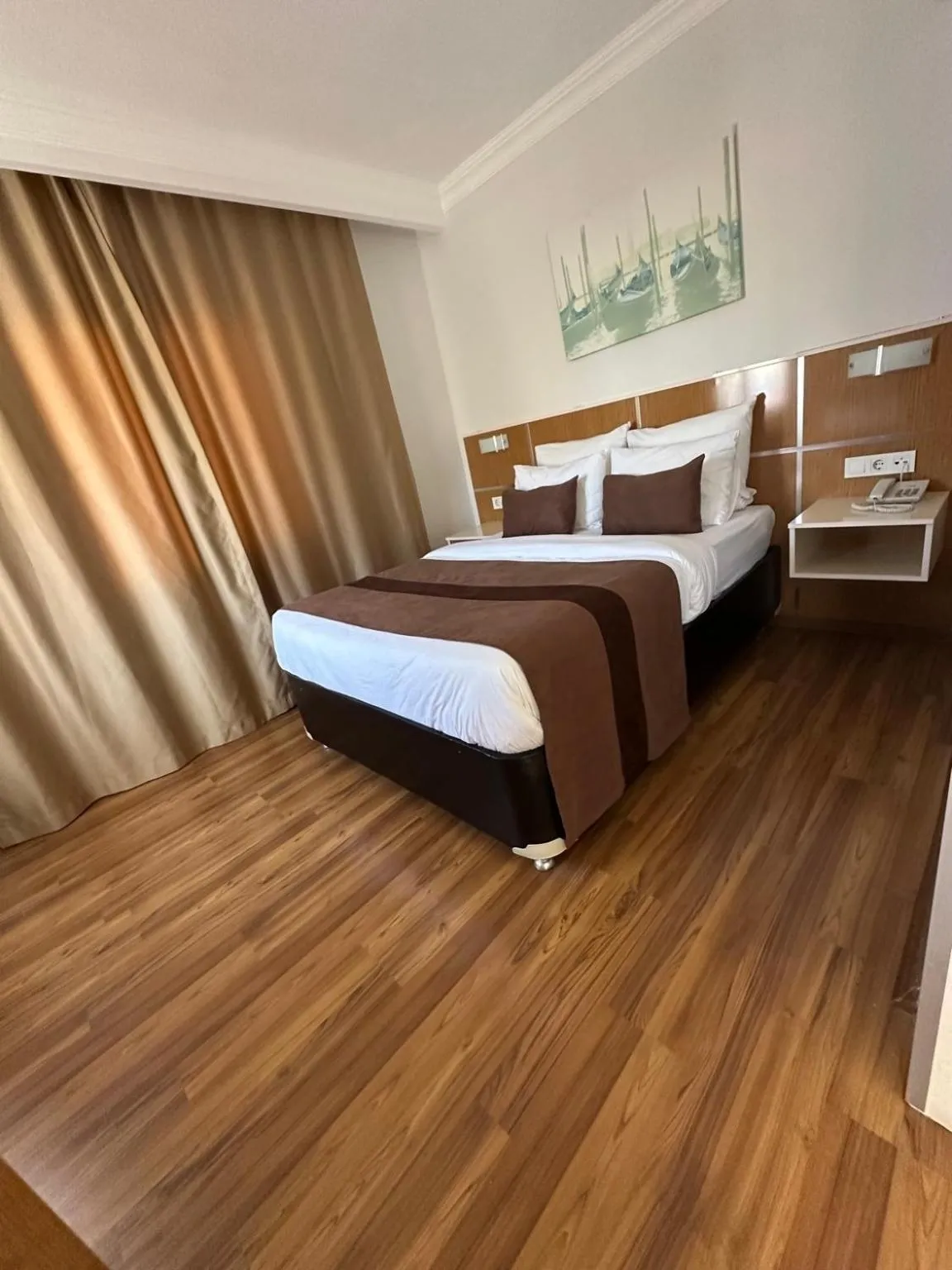 Bed in Palm Beach Hotel