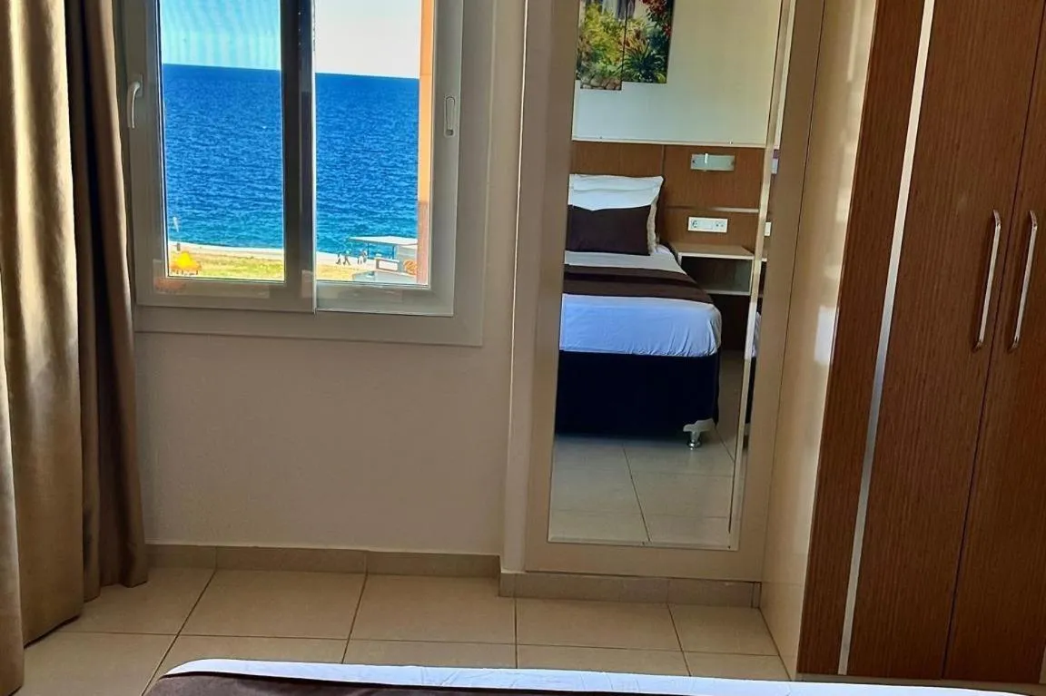 Bed in Palm Beach Hotel