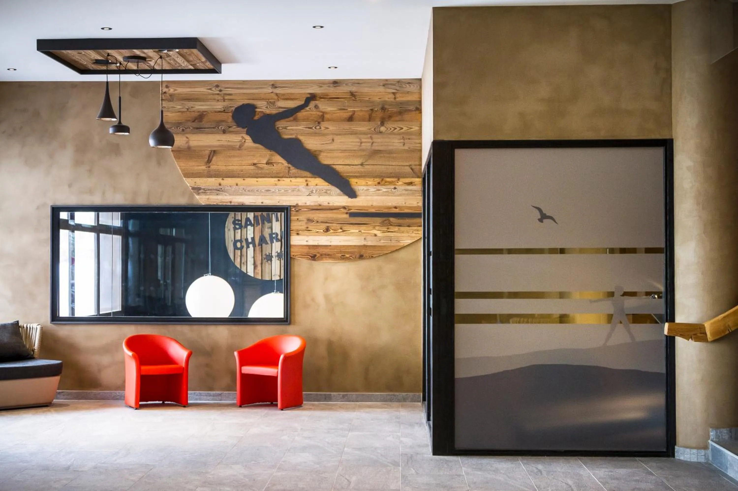 Communal lounge/ TV room in Hôtel Saint Charles Val Cenis