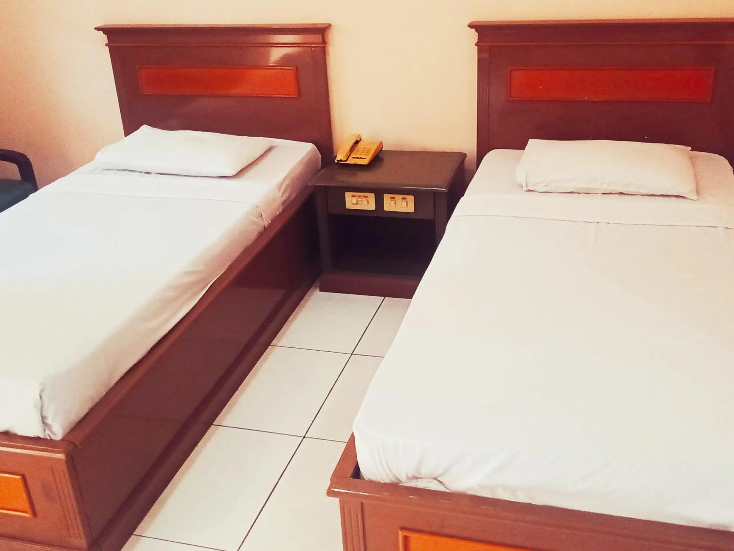 Bed in Hotel Wijaya Purwokerto