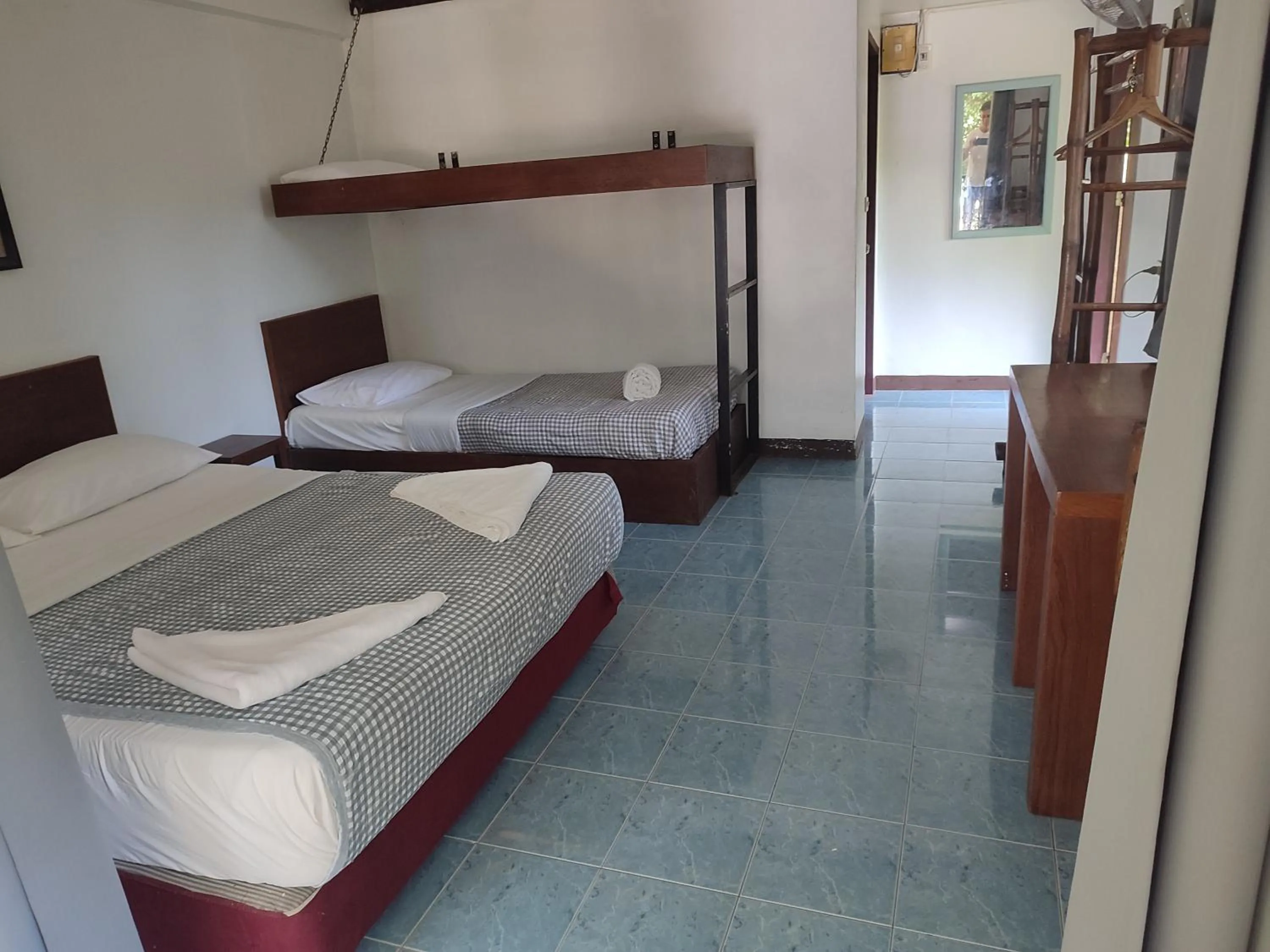 Bed in Poseidon Bungalows