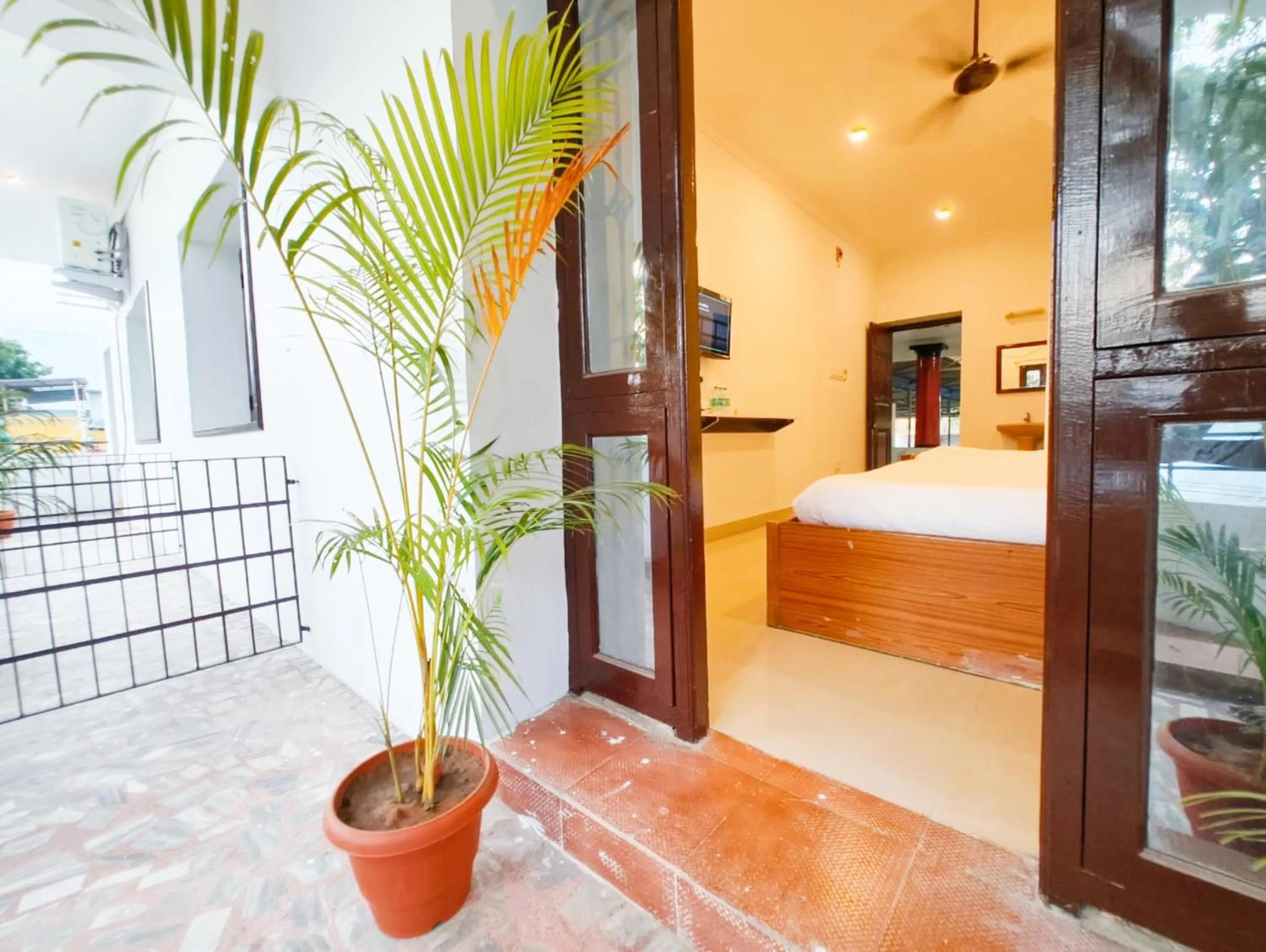 Balcony/Terrace, Bed in Hare Rama Hare Krishna - EESHA Hotel