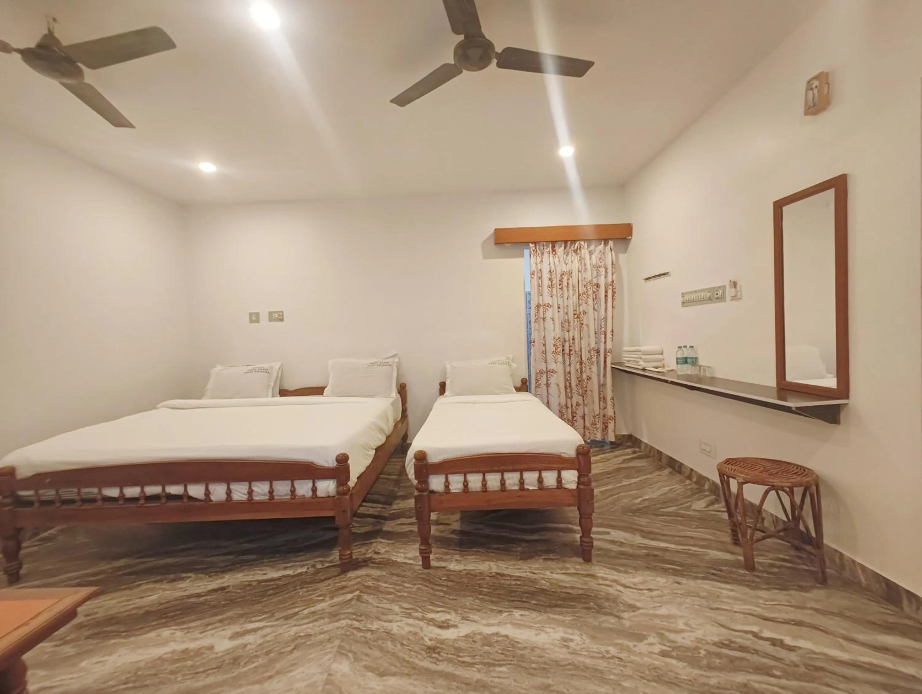 Photo of the whole room, Bed in Hare Rama Hare Krishna - EESHA Hotel