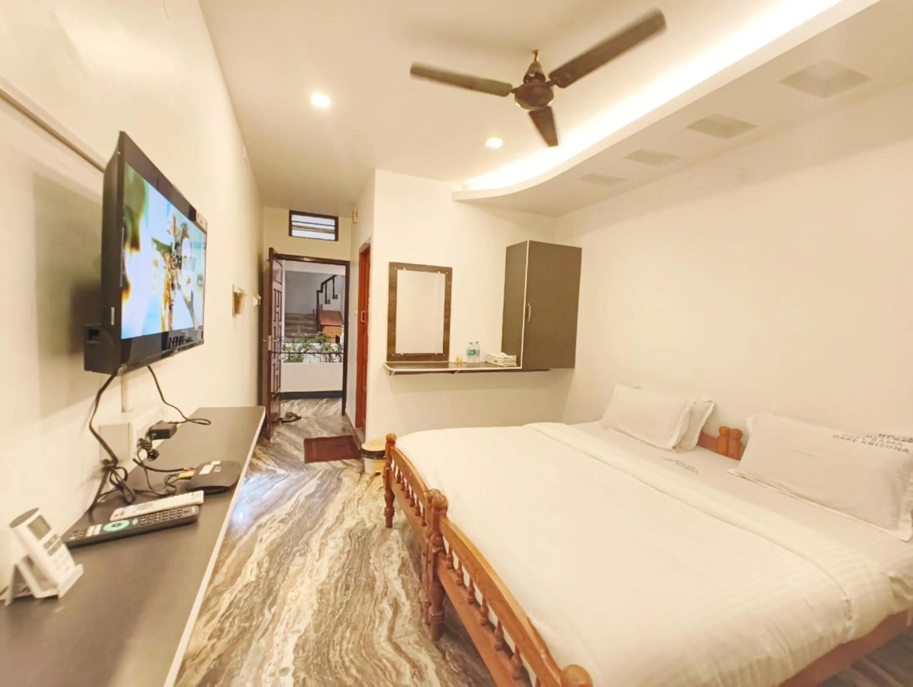 View (from property/room), Bed in Hare Rama Hare Krishna - EESHA Hotel