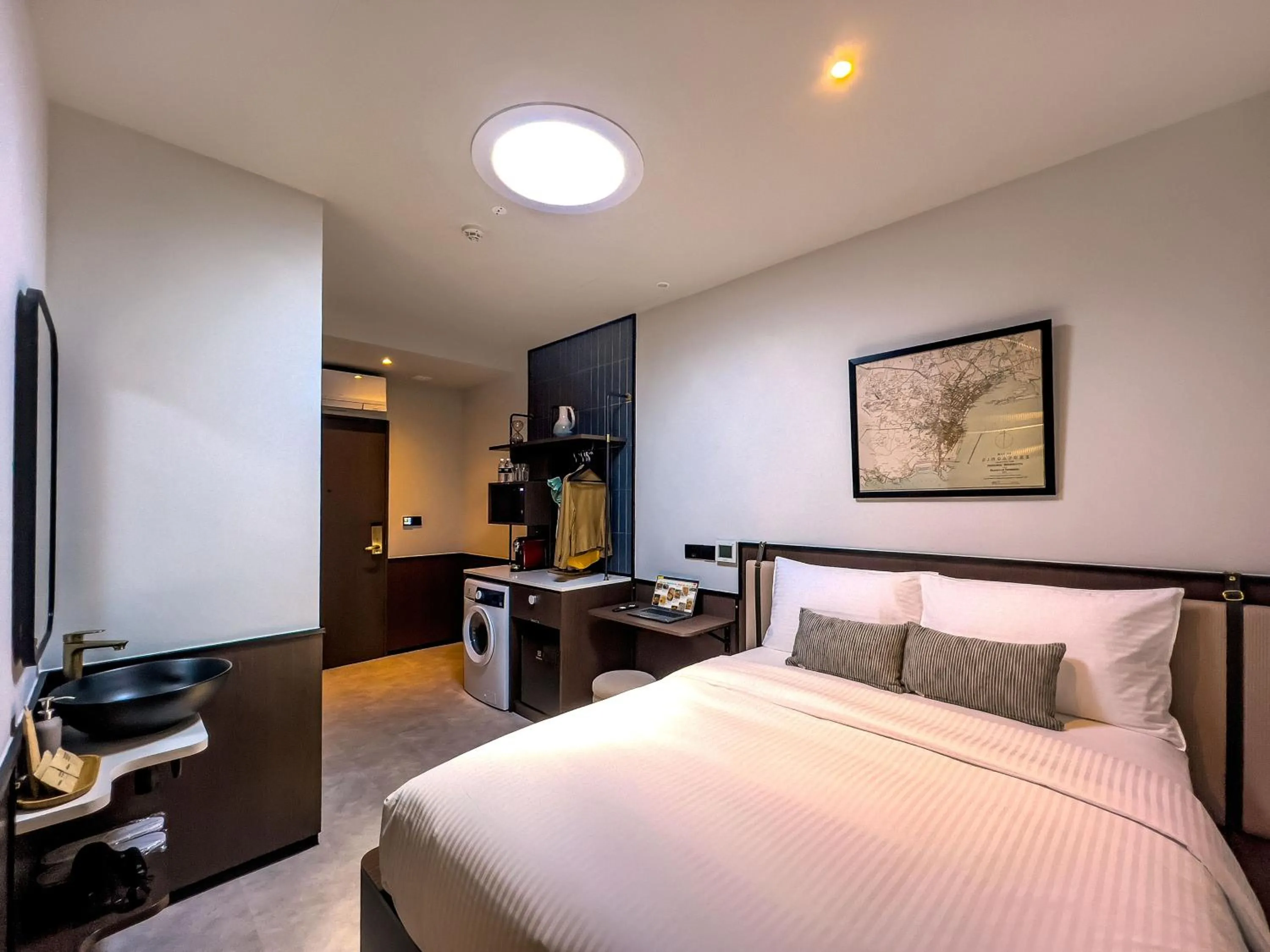 Photo of the whole room, Bed in Coliwoo Hotel Kampong Glam - CoLiving