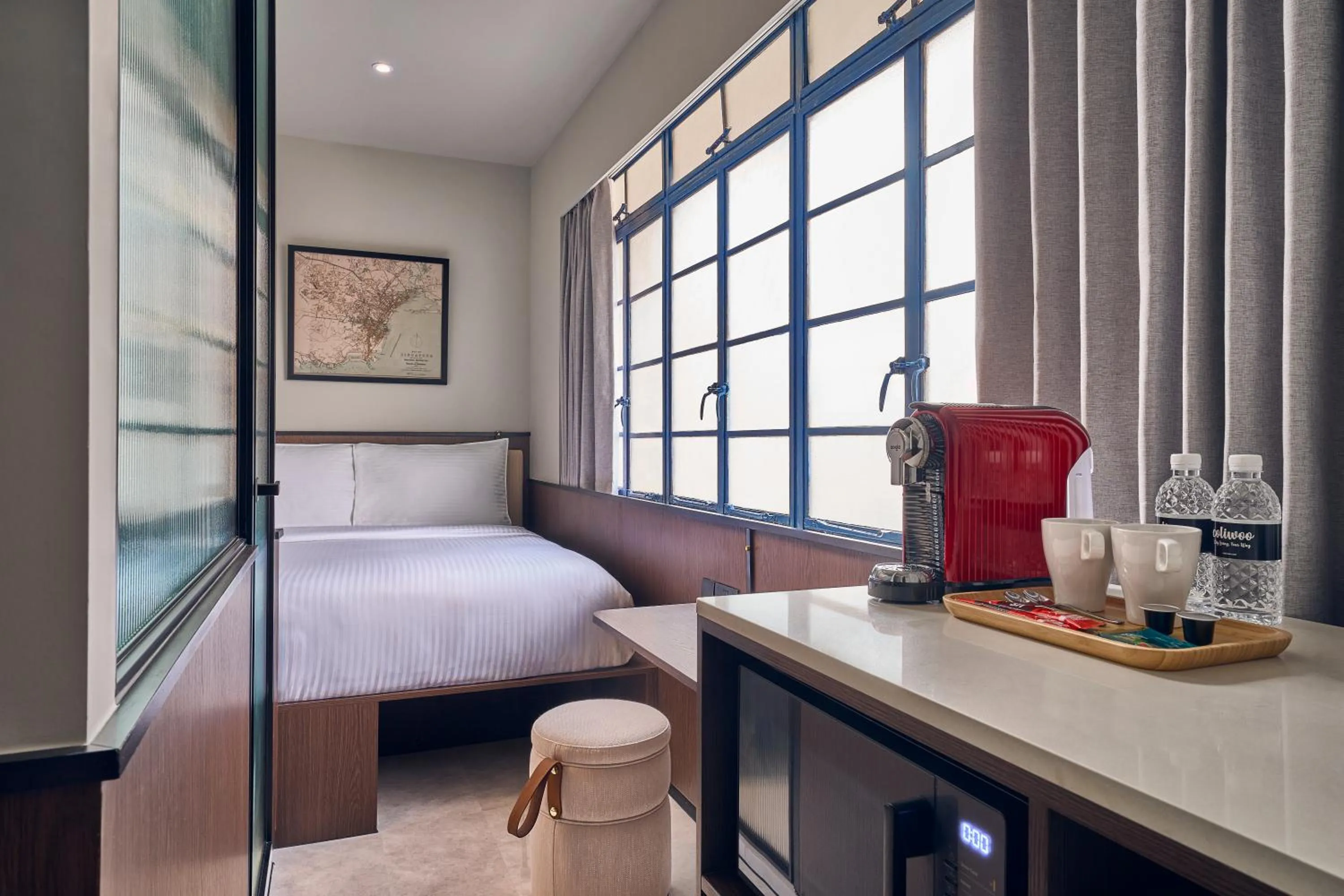 Kitchen or kitchenette, Bed in Coliwoo Hotel Kampong Glam - CoLiving