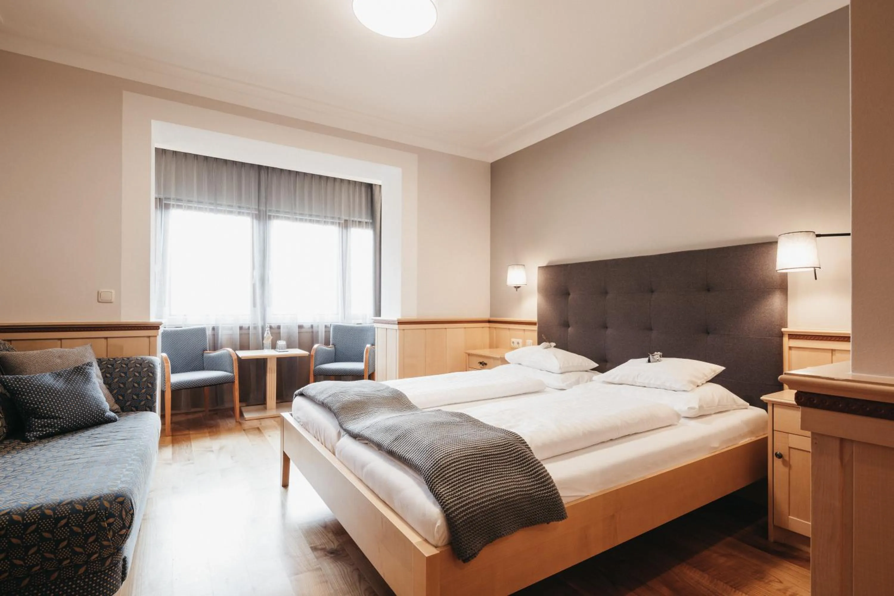 Bed in Naturhotel Bauernhofer