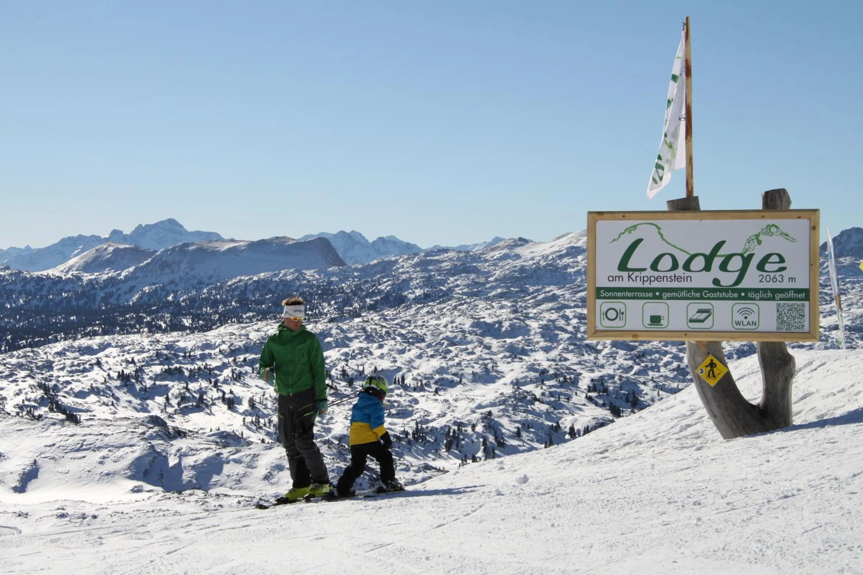 Property logo or sign in Lodge am Krippenstein