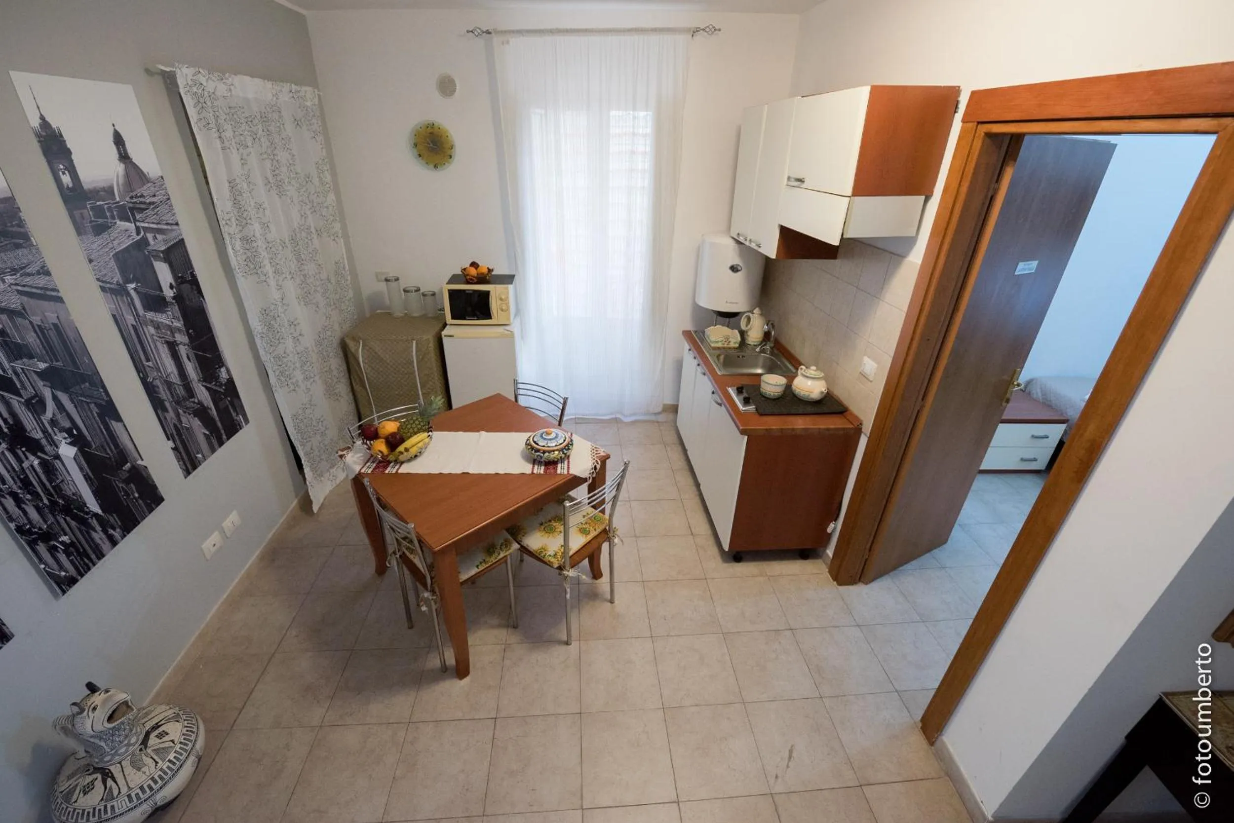 Communal lounge/ TV room in La Rosa Antica