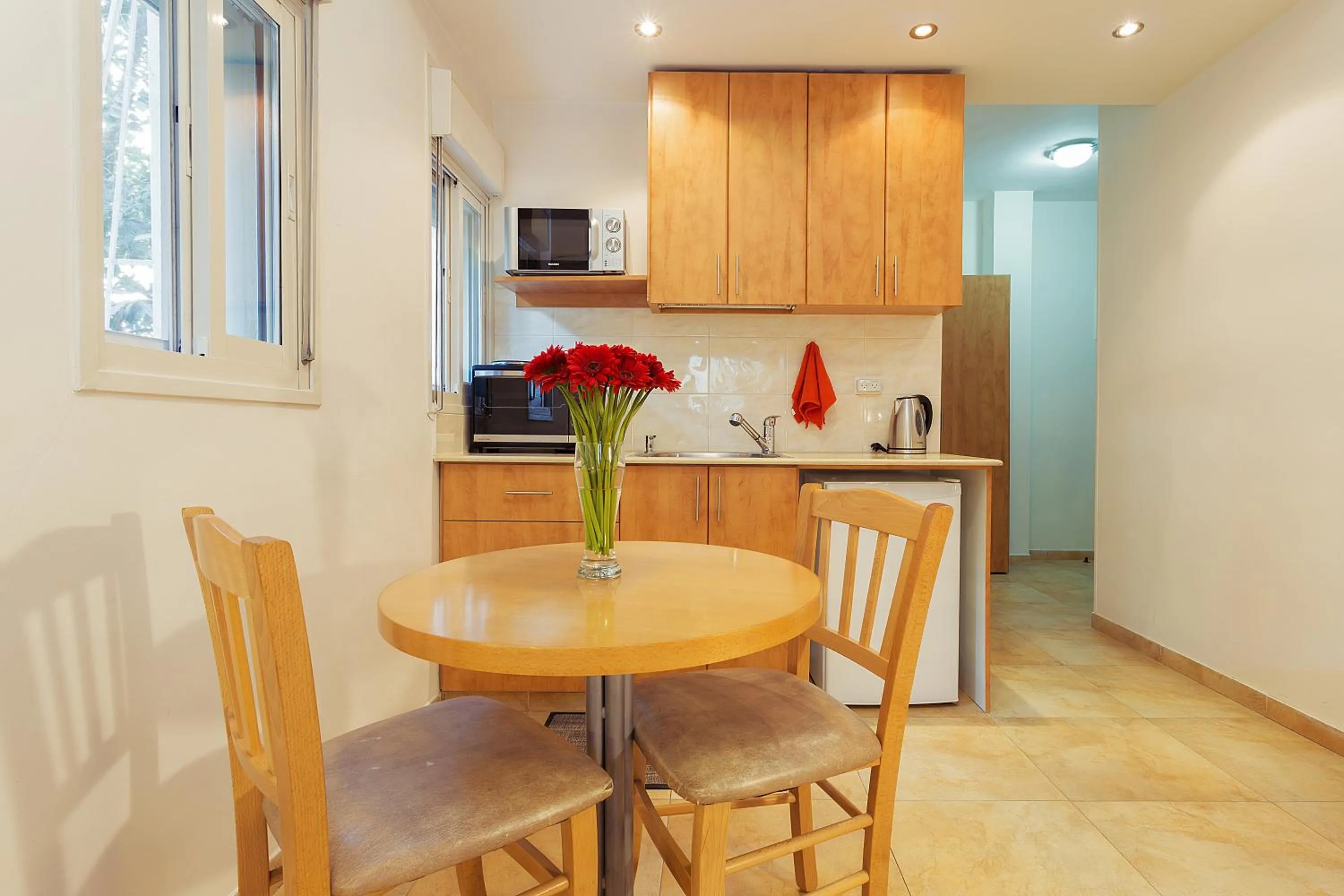Kitchen or kitchenette in Colony Suites- Hananya St.