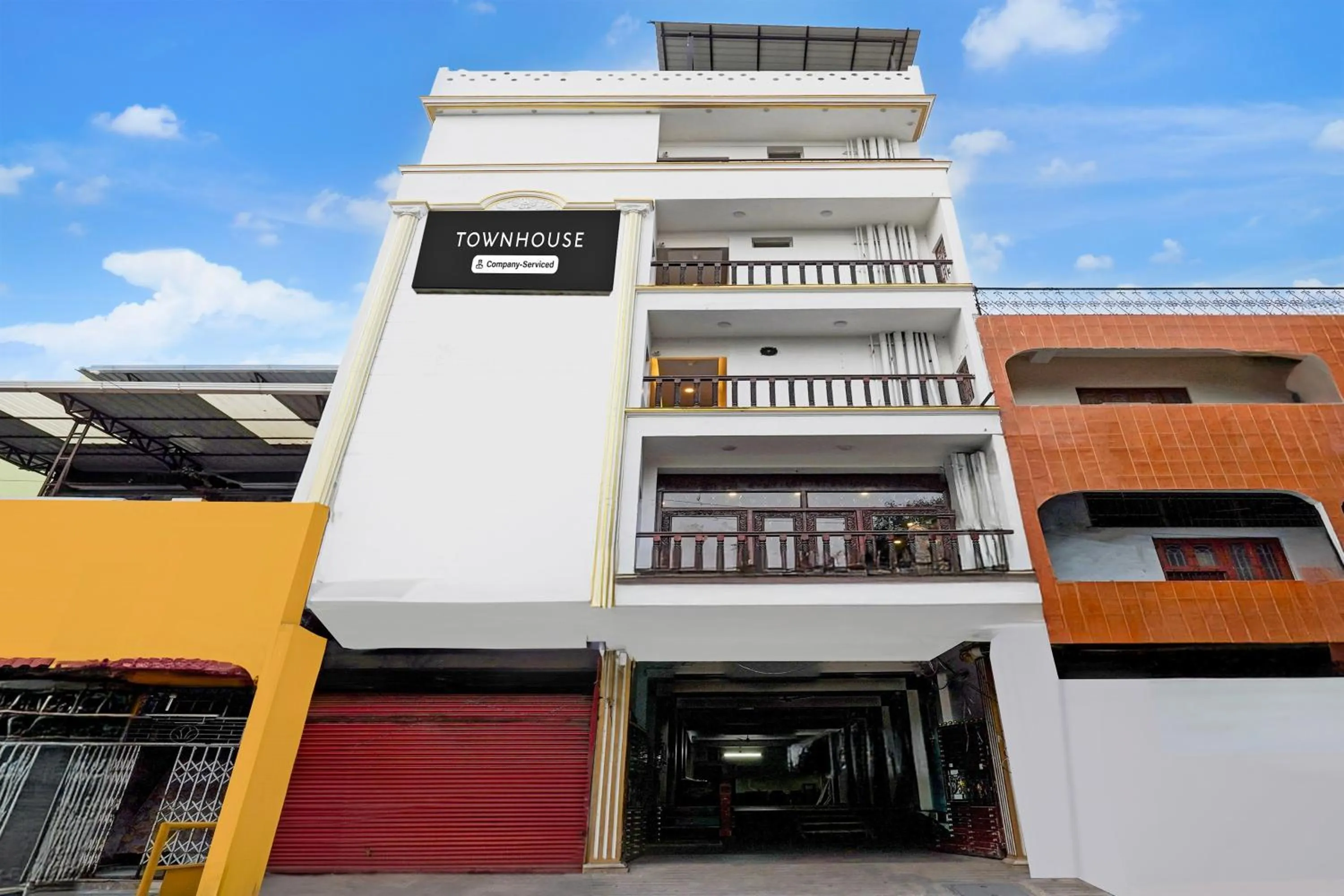 Facade/entrance in Super Townhouse White Town Rock Beach Formerly Prakasam Residency