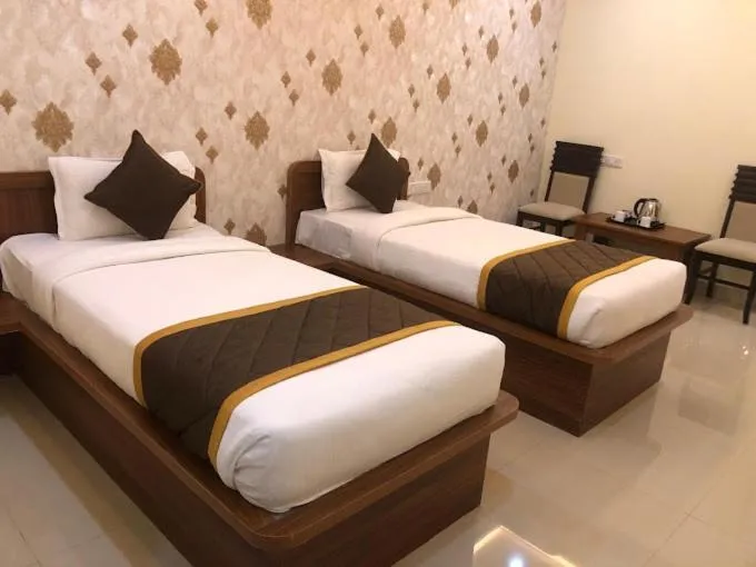 Bed in Hotel Partha Residency