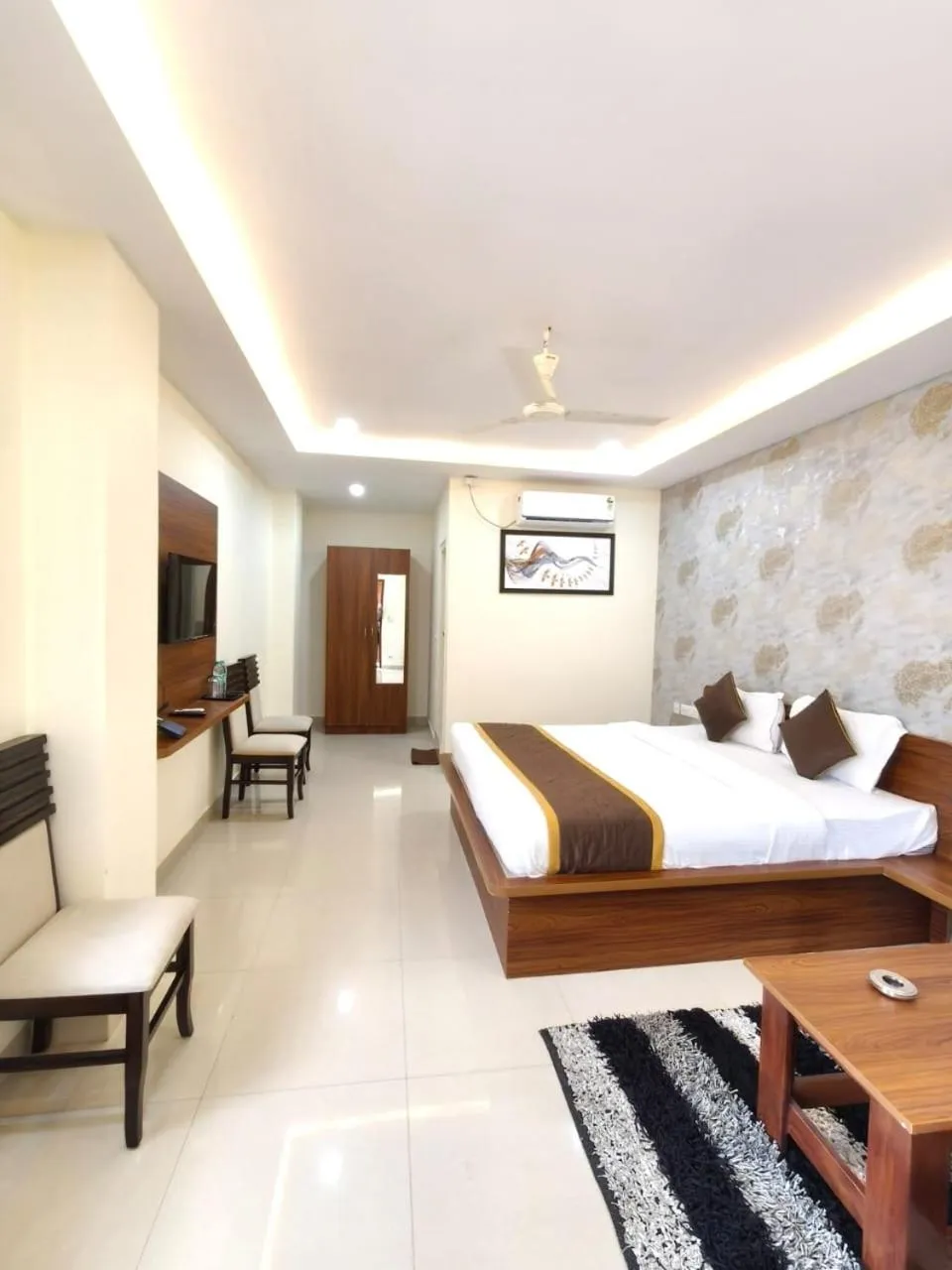 Bed in Hotel Partha Residency