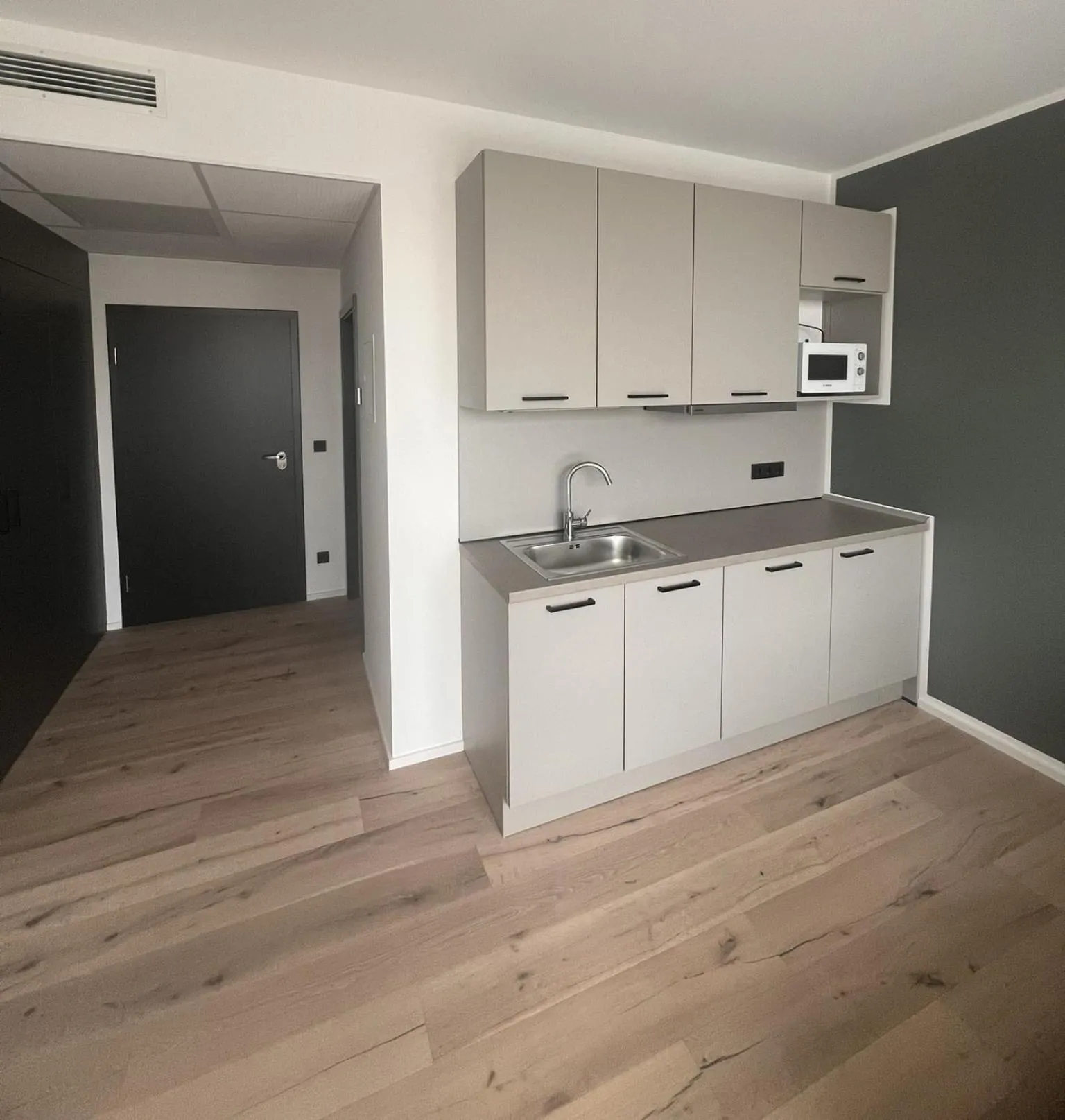 Kitchen or kitchenette in New Age Boardinghaus Bad Rappenau