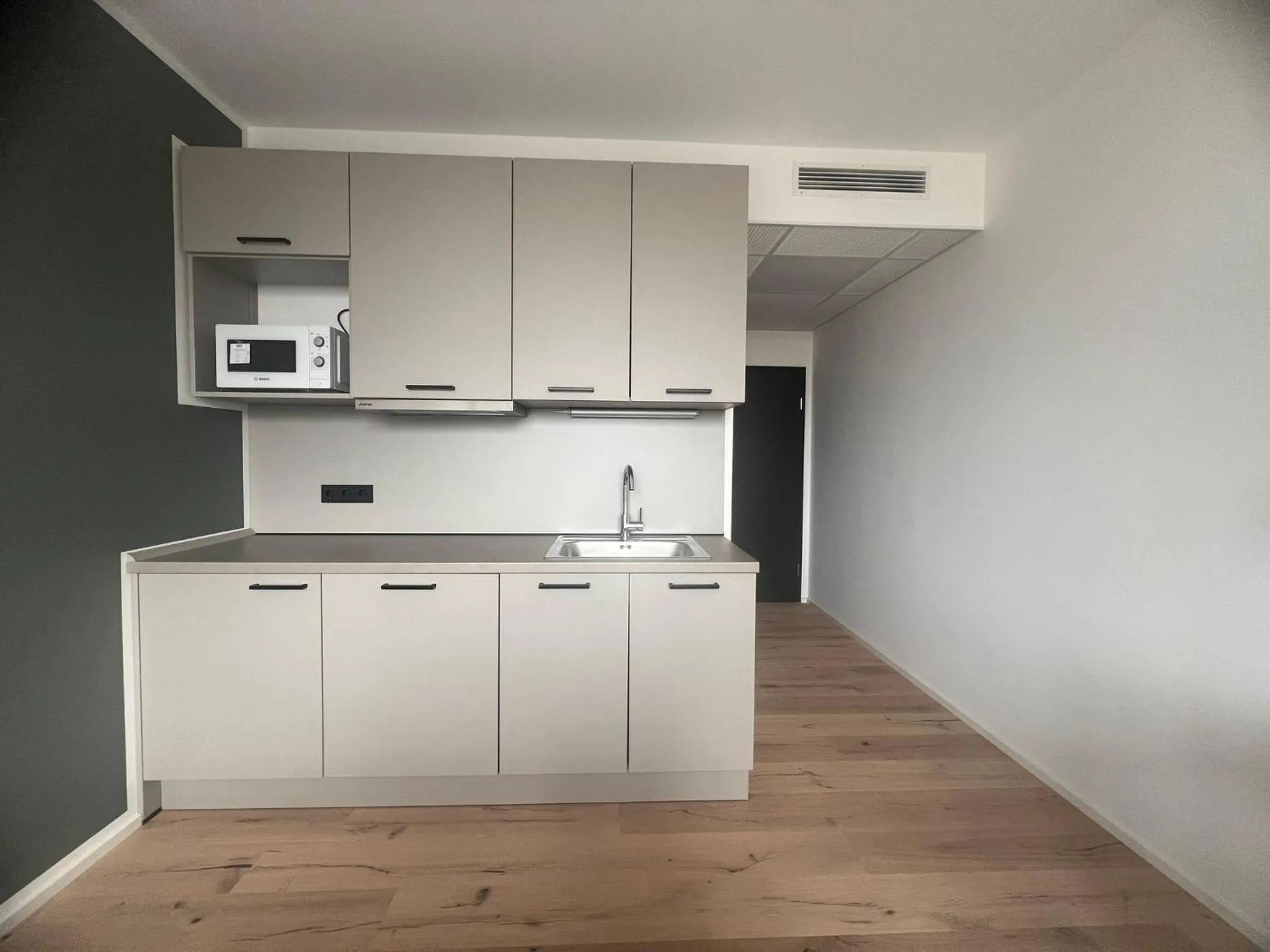 Kitchen or kitchenette in New Age Boardinghaus Bad Rappenau