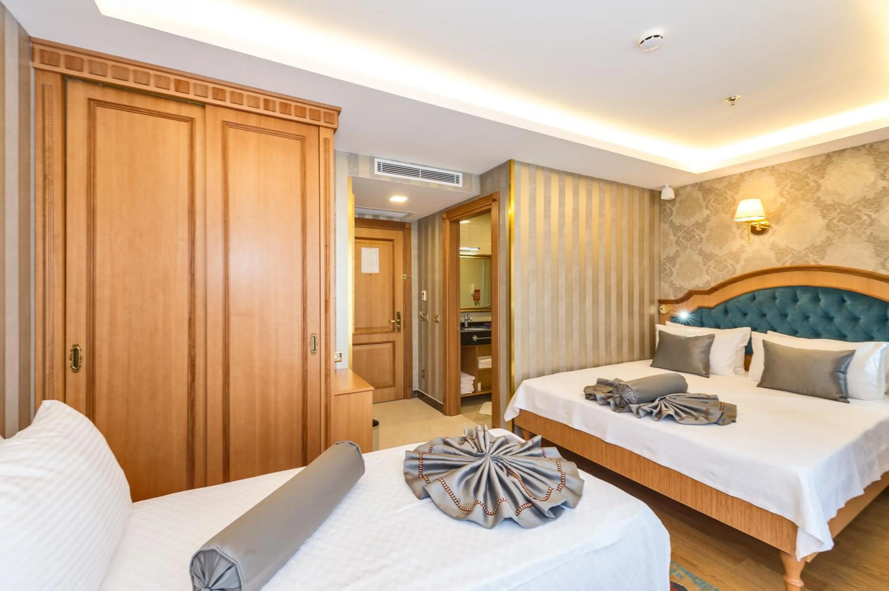 Decorative detail, Bed in Aprilis Gold Hotel - Special Category