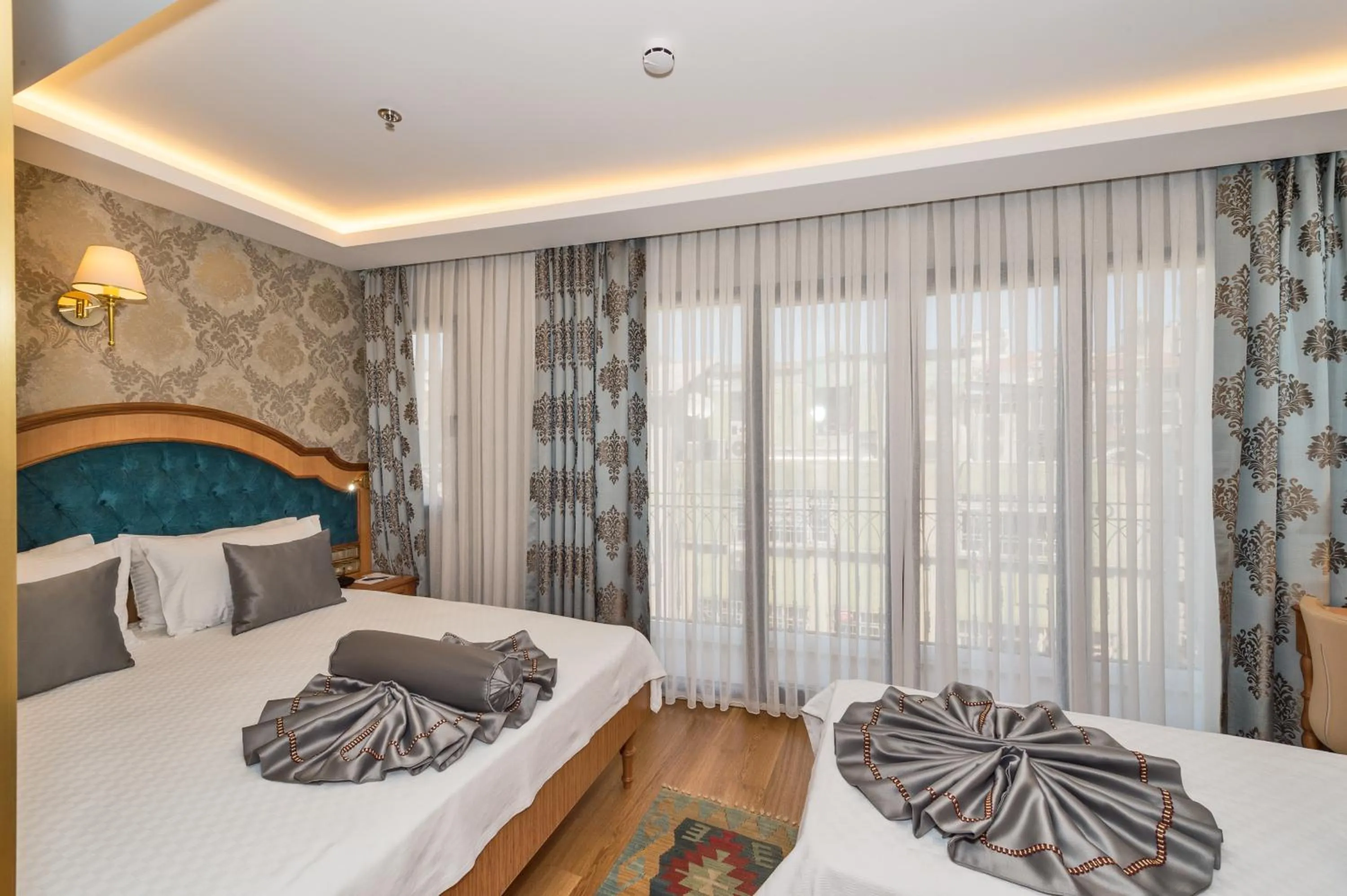 Decorative detail, Bed in Aprilis Gold Hotel - Special Category