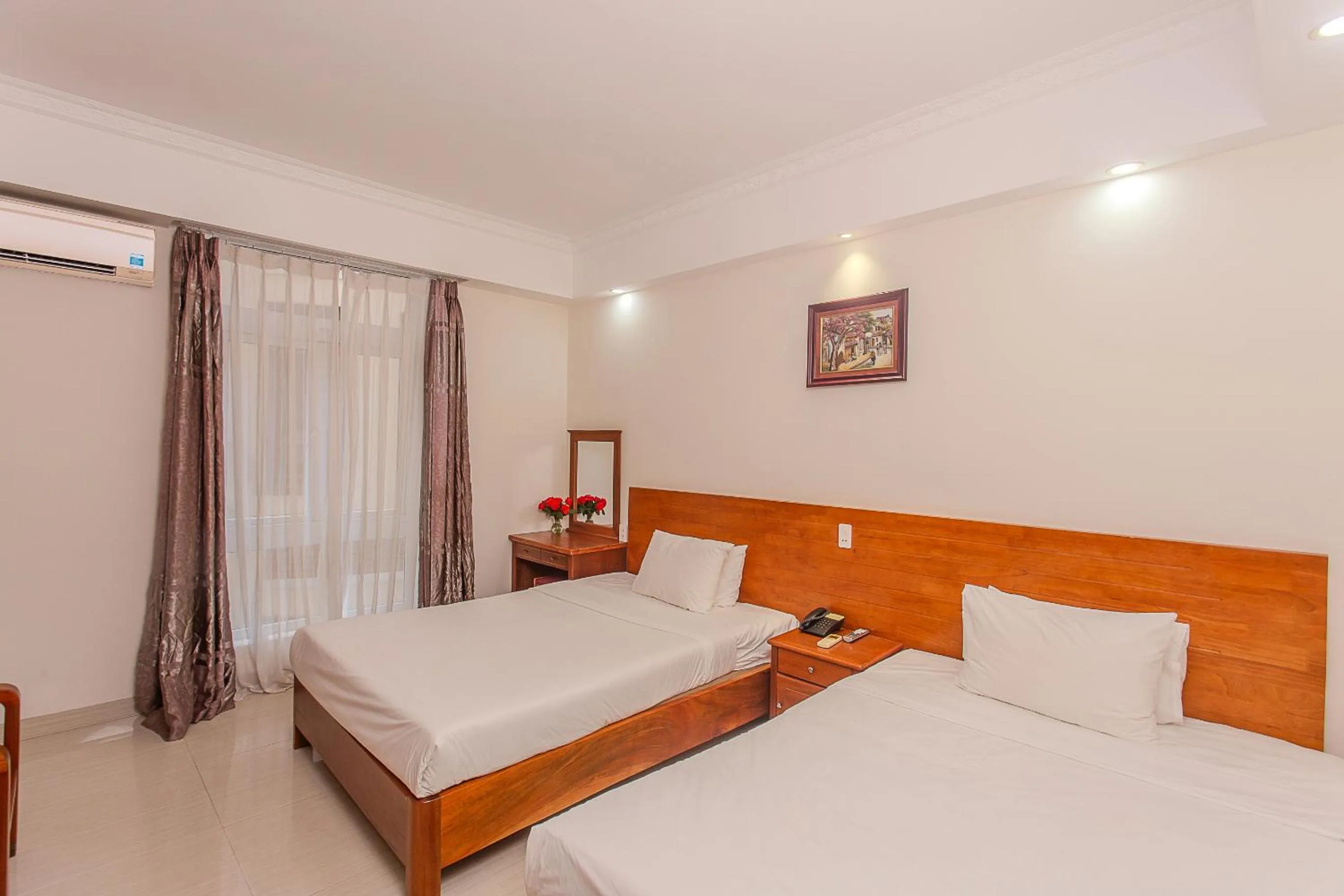 Photo of the whole room, Bed in Seavitel Danang Beach Hotel