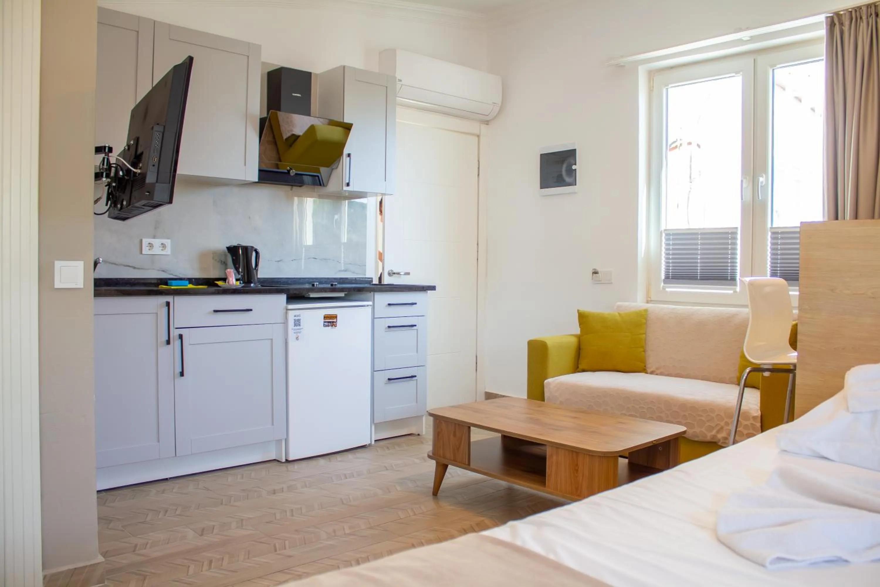 Kitchen or kitchenette, Bed in Güden-Pearl