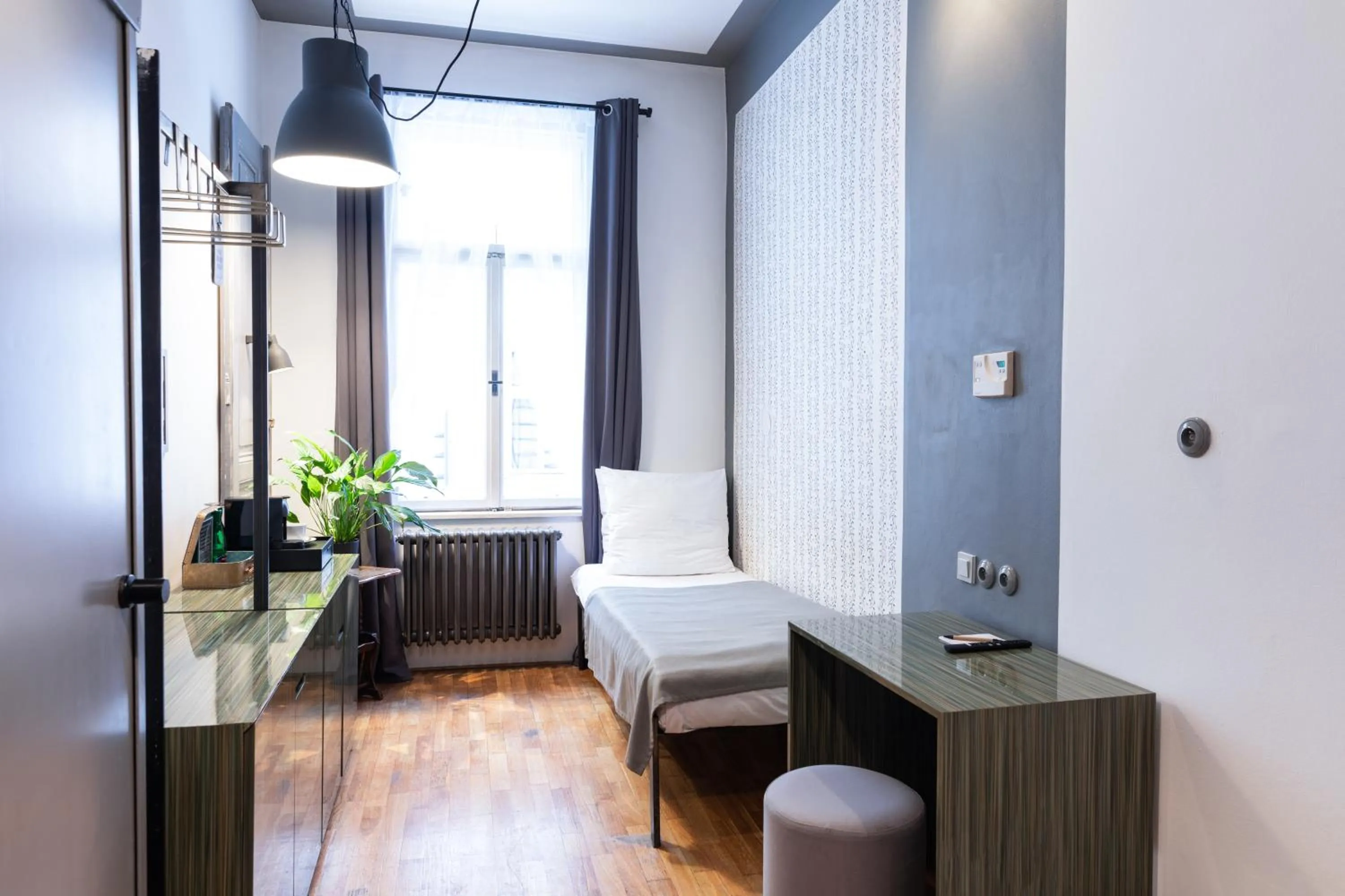 Bedroom in Miss Sophie's New Town & Wellness