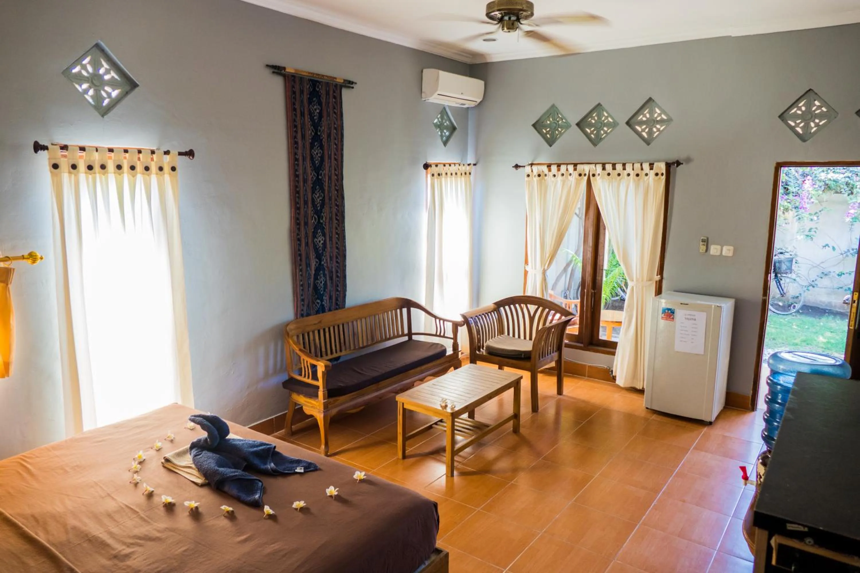 Bed in Mandalika Cottage