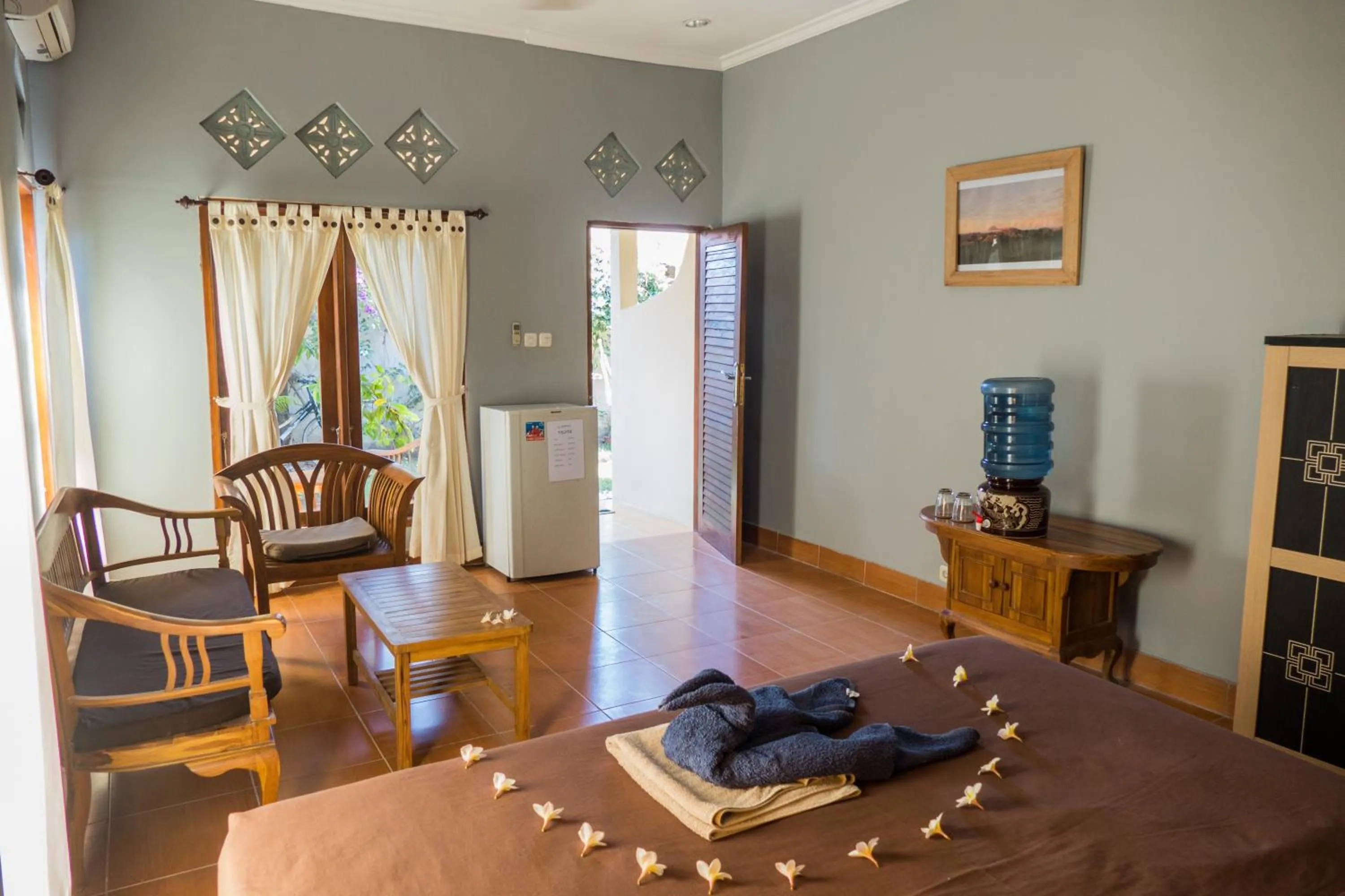 Bed in Mandalika Cottage